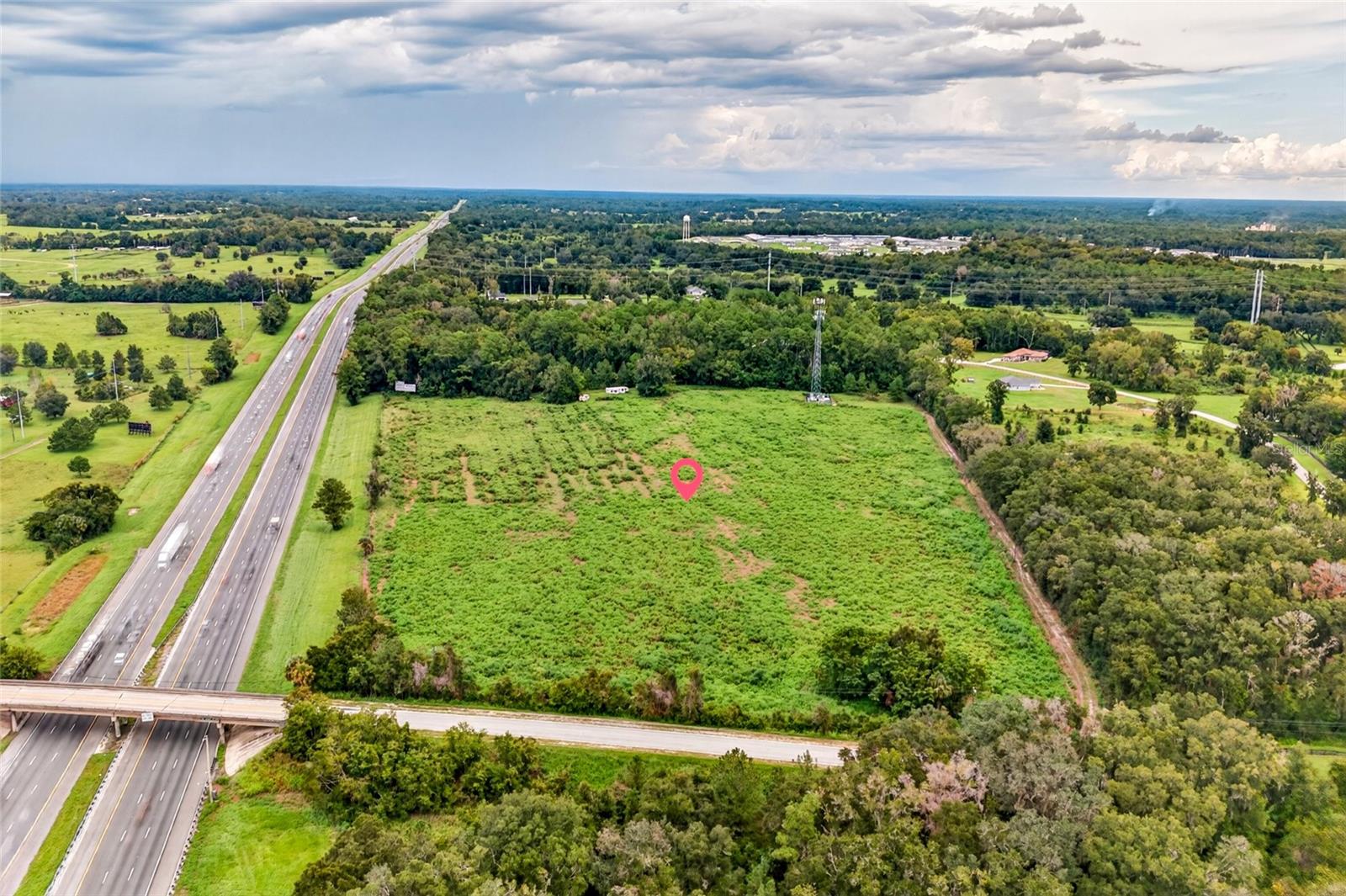 23 ACRES | A-1 ZONING | WELL | NW OCALA HORSE COUNTRY | NO HOA - An exceptional opportunity to own 23 acres in the heart of Ocala’s renowned Horse Country, ideally located at 4949 NW 100th Street, Ocala, Florida. Zoned A-1 Agricultural, this expansive property offers the space, flexibility, and location sought by equestrian enthusiasts, farm owners, investors, and those looking to create their own private Ocala retreat. The property features a private well and approximately 23 acres of land, providing an excellent canvas for a future equestrian estate, agricultural operation, private farm, or custom country property, subject to zoning and county approvals. Location is a major highlight. Situated in NW Ocala, this property places you within convenient reach of World Equestrian Center, one of the premier equestrian destinations in the country, as well as HITS Ocala, making it especially attractive to riders, trainers, breeders, owners, and equestrian investors. WEC hosts major hunter/jumper and other equestrian competitions throughout the year. Enjoy the best of Ocala’s equestrian lifestyle while remaining close to major horse show venues, established farms, equestrian services, feed stores, veterinary care, and convenient access to I-75.  Whether your vision is a private horse farm, training facility, agricultural property, or a peaceful country estate, 23 acres in this location represents a rare opportunity to secure a sizable tract in one of Florida’s most sought-after equestrian markets. Bring your vision and create something special in the Horse Capital of the World.