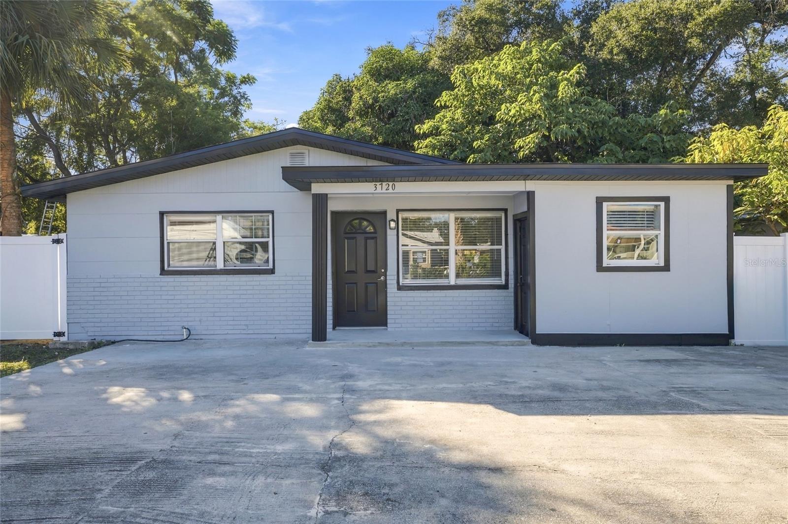 Welcome to this beautifully renovated 3-bedroom, 2-bathroom home in Tampa, FL 33619!... NEW ROOF 2026 !!! featuring gorgeous flooring throughout, a stylish kitchen with stainless steel appliances, and beautifully updated bathrooms, this home offers modern finishes and comfortable living. Enjoy the spacious, fenced backyard with plenty of room for outdoor entertaining, relaxing, and activities. Conveniently located near shopping, dining, parks, and major roadways, with access to the Selmon Expressway and I-4 for commuting throughout Tampa Bay. Nearby outdoor recreation includes Palm River Park and Veterans Memorial Park & Museum. Don't miss this opportunity to enjoy a beautifully updated home with great indoor and outdoor space!