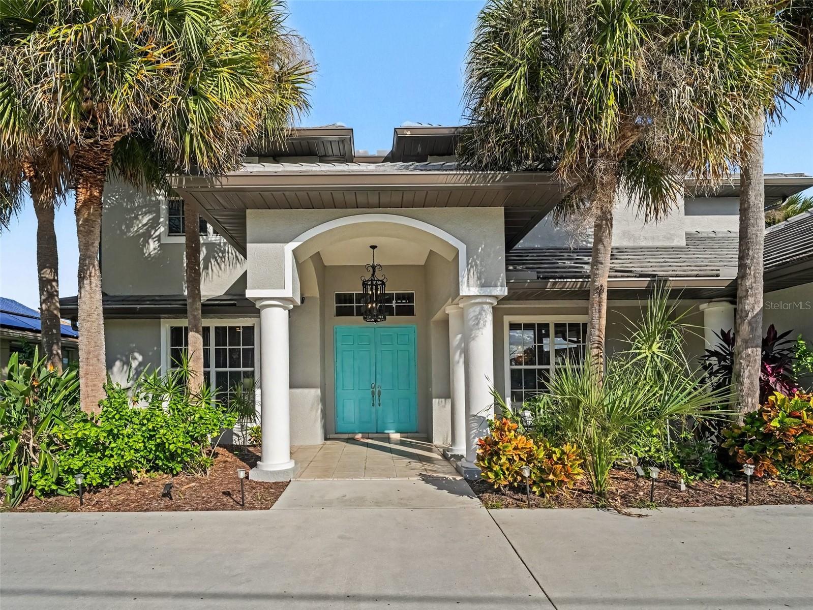 WATERFRONT PARADISE ! Welcome to this show-stopping 4-bedroom, 3-bathroom pool home situated on a canal along Alligator Creek, leading directly out to Charlotte Harbor and the Gulf of Mexico. Featuring a private 10' x 35' dock right in your backyard, this home is built for the ultimate Florida lifestyle. The main level offers high-volume ceilings, an open living/dining layout, a stunning kitchen with breakfast bar, a dedicated library/office space, and a main-floor guest suite with direct lanai access. Upstairs features a spacious primary suite, a second guest bedroom with its own private balcony, a third bedroom, and a large open loft flex space. Step outside to your private screened lanai featuring an in-ground heated pool with serene canal views. Generous parking with a 3-car garage and a large driveway with room for boat trailer parking. Minutes to local beaches, dining, golf, and shopping on Lake View Blvd. Ideal as a primary residence, tropical retreat, or high-performing investment property! Please note pool light is brand new and not operational. Boat lift needs a twisted cable repair and price reflects these items. Stained glass above entry does not convey.