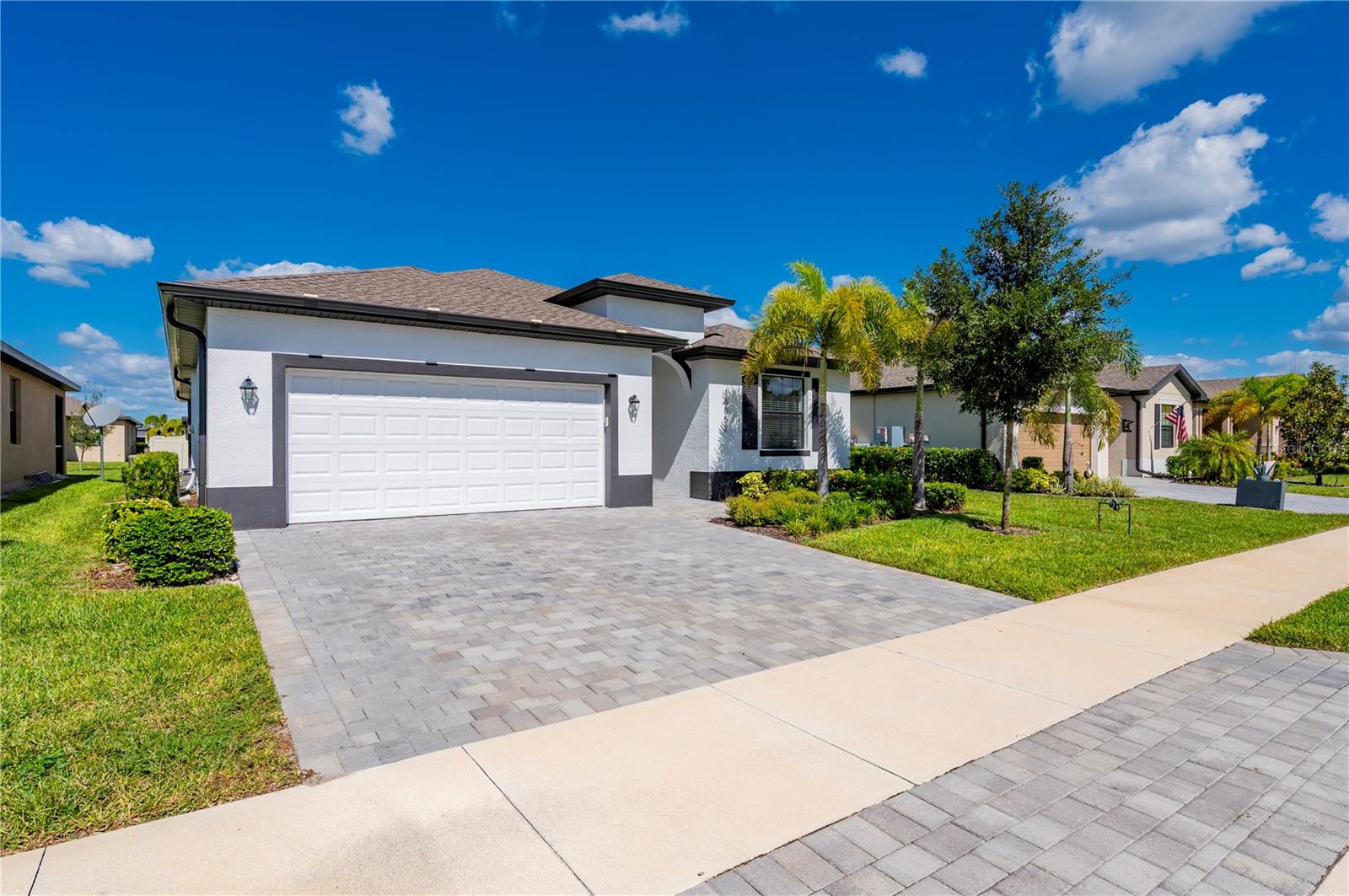 Better than new! Built by Lennar in 2024, this beautifully maintained 3-bedroom, 3-bath home  with a den offers 2,217 sq. ft. of air-conditioned living space, plus a 450 sq. ft. garage and 225  sq. ft. screened lanai. 

The spacious kitchen with stainless steel appliances opens to an incredible great-room design,  creating a bright, open setting ideal for both everyday living and entertaining. The oversized  primary suite features generous walk-in closets, while tile flooring throughout gives the home a  clean, stylish, easy-care finish. Thoughtfully designed, beautifully maintained, and move-in  ready, this home truly shows better than new. 

Located in the desirable West Port community of Port Charlotte, the home enjoys an outstanding  location near Centennial Park and the Centennial Recreation & Aquatic Center, with swimming,  fitness facilities, sports courts, walking trails, playgrounds, ball fields, and other recreational  opportunities nearby. West Port is conveniently positioned for shopping, dining, medical  facilities, Charlotte Sports Park, area golf courses, and Gulf Coast beaches. 

Best of all, Costco and Wellen Park and the under construction Sarasota Memorial Hospital are less than 20 minutes away, putting an exceptional variety  of shopping, dining, entertainment, and everyday conveniences within easy reach. With a nearly  new home, an outstanding floor plan, and one of Port Charlotte's most convenient locations, this  property offers the perfect combination of comfort, quality, and Florida lifestyle.