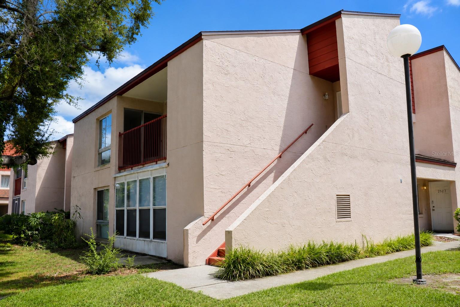 NEW LOW PRICE!  INVESTMENT OPPORTUNITY!  This inviting two-bedroom, two-bath condominium offers comfort, functionality, and an excellent  location near the Mall of Millennia and Universal Studios.  The spacious living room serves as the heart of the home and opens directly onto a covered balcony, perfect for relaxing and enjoying the fresh air,  overlooking a tranquil pond. This outdoor space is also accessible from the secondary bedroom, adding flexibility and appeal.  There is also a 5' x 5' exterior storage opening off the balcony.  The  kitchen opens to the generous dining area with a convenient breakfast/service bar and features a closet pantry, providing additional storage for food and appliances.  The primary suite is thoughtfully designed  with a 5' x 8' walk-in closet, a separate linen closet, and an en suite bathroom which has been tastefully updated and features a step-in shower.  The secondary bedroom offers dual closets and the secondary bath has also been updated.  There is an additional linen closet in the hall.  Located within a community that offers tennis courts, a clubhouse, a fitness center and a large sparkling pool, this condominium delivers an  active and enjoyable lifestyle.  Included with your Condo Association fees are internet, water, sewer, trash and interior pest control.   The HVAC was replaced in 2020.  With easy access to I-4, this property is conveniently situated near the Orlando attractions and provides a direct route to the beautiful east coast beaches, making it ideal for both everyday living and weekend getaways.  Book your private tour today!