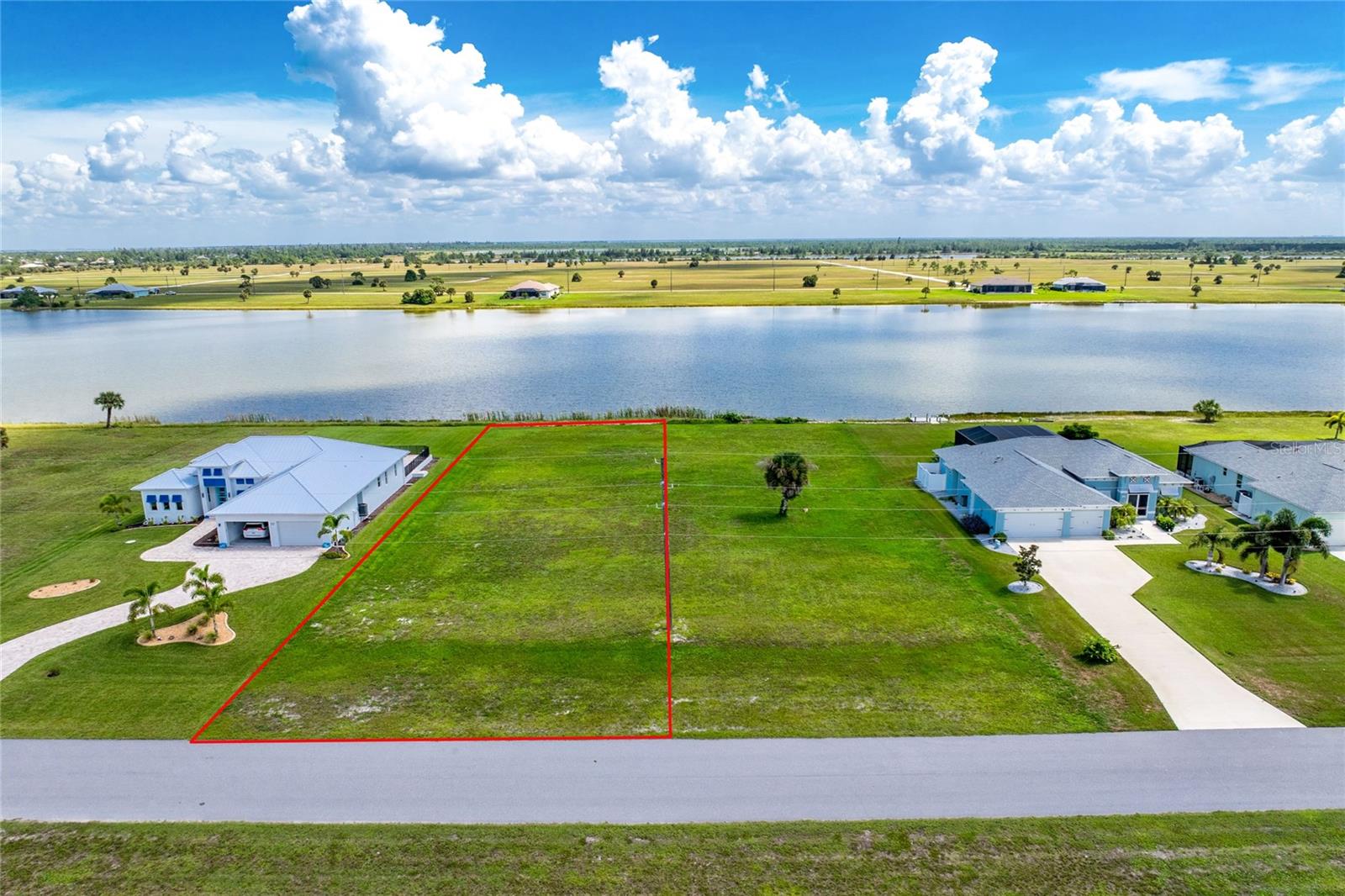 Enjoy exceptional lakefront views from this 80' x 225' parcel in Rotonda Meadows! This property offers generous space between the road and the pond, creating an open setting for your future Florida home. Riprap along the water adds definition to the shoreline, while the peaceful waterfront setting gives you a beautiful backdrop right from your own backyard. Located in an area of estate-sized homes, you’ll be close to everything that makes this part of Florida special. Spend the day on the beautiful beaches of Boca Grande and Manasota Key, enjoy world-class tarpon fishing and boating, play a round at one of the many nearby golf courses, or explore the local restaurants and shops of Englewood and Placida. You’re also conveniently located near Port Charlotte, Punta Gorda and Venice, with shopping, medical facilities and two Major League Baseball spring training venues within easy reach. Public water and sewer are available for connection at the property boundary. Whether you’re ready to build now or planning for the future, come see the possibilities waiting for you at 20 Yellowhammer Drive!