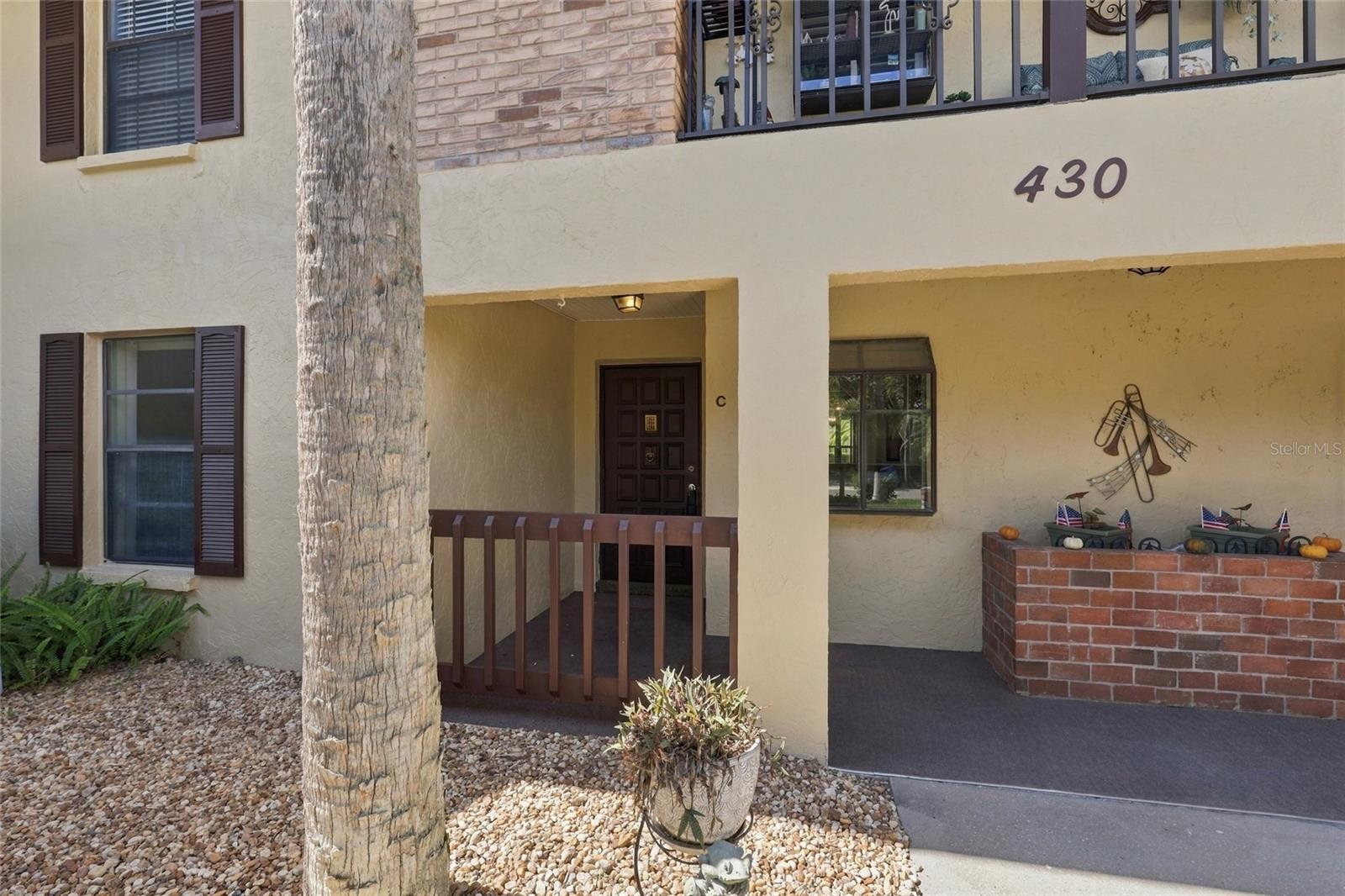 Welcome to this charming first-floor 2-bedroom, 2-bath condo in Venice, offering comfortable Florida living in a beautifully maintained community. The inviting living and dining combination features a wet bar with additional storage and sliders that open to an enclosed lanai overlooking lovely, lush landscape views, an ideal spot to relax and enjoy the peaceful surroundings. The bright kitchen offers a convenient workspace, ample cabinet and counter space, and a breakfast bar that opens to the dining and living areas. The primary bedroom features an ensuite bath, walk-in closet, and French doors leading directly to the enclosed lanai. A second bedroom and full bath provide comfortable accommodations for guests or flexible living space. An in-unit laundry closet adds everyday convenience, while covered parking provides protection from the Florida sun and weather. Enjoy the community's inviting pool and beautifully landscaped grounds. Ideally located near the Gulf beaches, historic downtown Venice, shopping, dining, and the many attractions that make Venice such a desirable place to call home. Whether you're looking for a full-time residence, seasonal retreat, or investment opportunity, this condo offers a wonderful combination of comfort, convenience, and Florida lifestyle. All information recorded in the MLS is intended to be accurate but cannot be guaranteed, buyer advised to verify. Sold As-Is. Listing agent has no knowledge of property or disclosures.