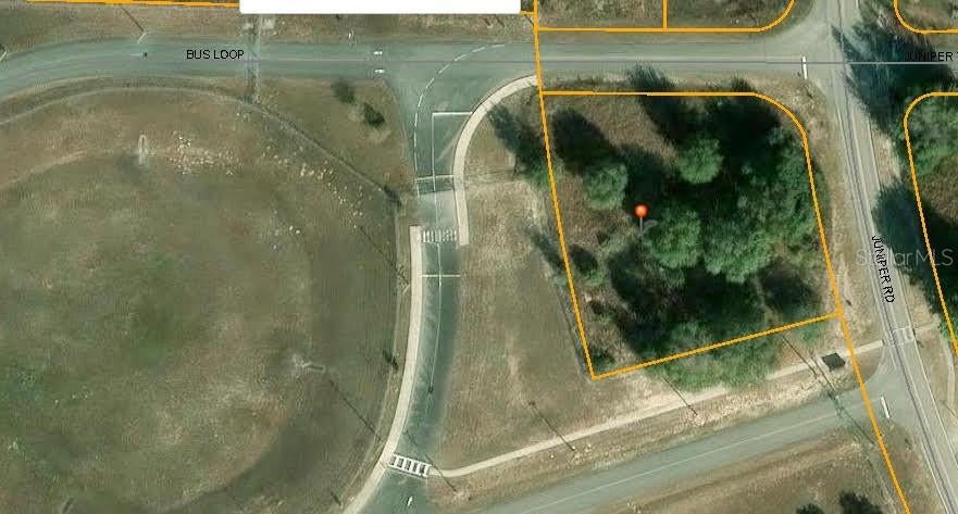 Exceptional development opportunity in the Silver Springs Shores area of Ocala! This approximately 0.93-acre vacant parcel is zoned R-3 with a Land Urban Residential future land use designation, creating an attractive opportunity for multifamily residential development. The property has the potential to accommodate up to 14 dwelling units, subject to engineering requirements, site plan approval, permitting, and all applicable county regulations. The property is conveniently located near schools, established residential communities, shopping, dining, and major roadways, offering easy access to everyday amenities while remaining surrounded by continued residential growth. The parcel’s location and zoning make it well suited for an investor, builder, or developer looking for their next multifamily project. Whether the goal is to build and hold for rental income or develop for future resale, this property offers multiple possibilities for a well-positioned residential project.