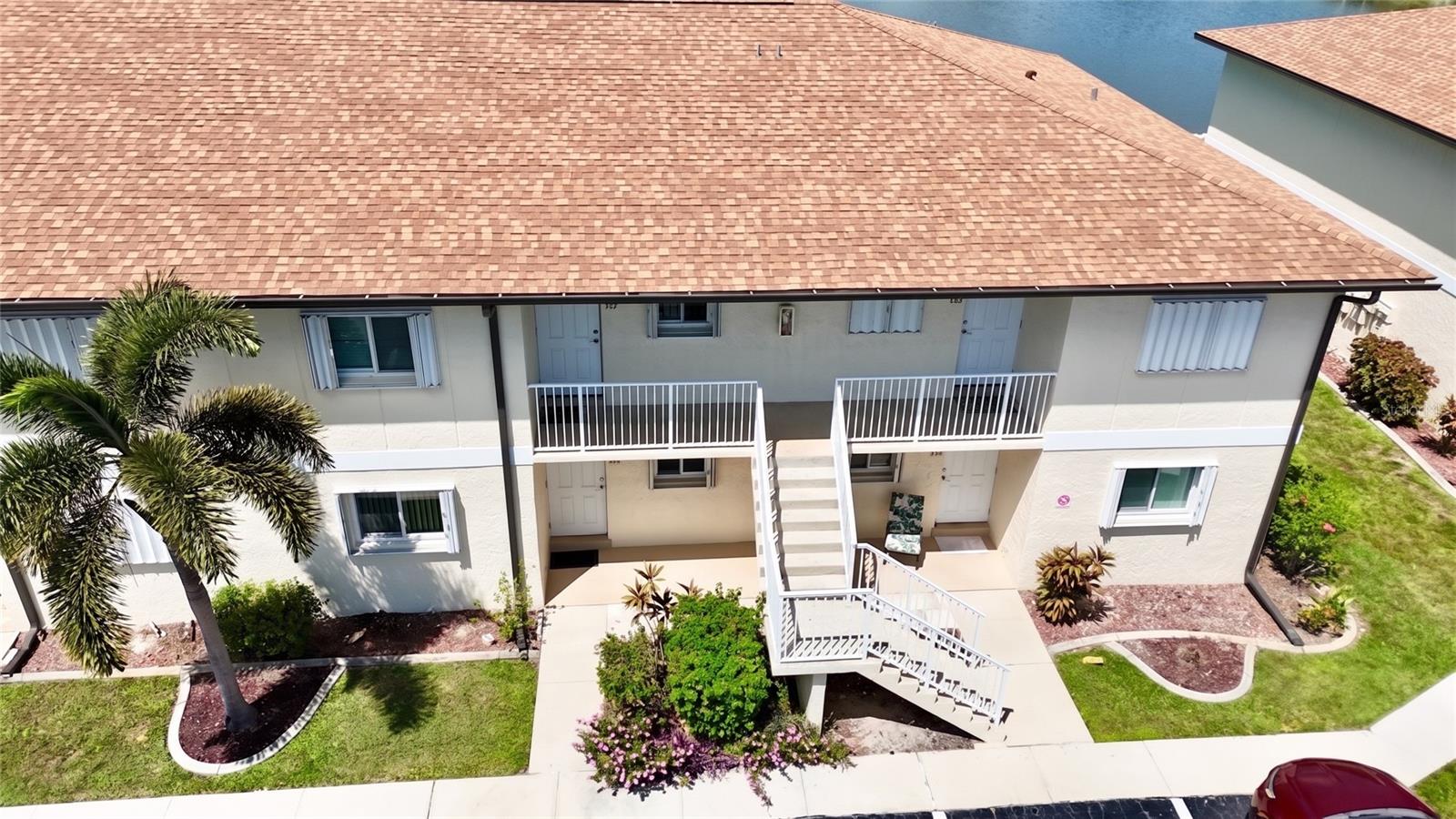 WATERFRONT LIVING WITH ENDLESS POTENTIAL — SPECIAL ASSESSMENT PAID IN FULL! Enjoy sweeping lake and fountain views from the screened lanai of this top-floor 2-bedroom, 2-bathroom condo in the desirable Lakeside of Charlotte County community. Featuring an open-concept living and dining layout with ceramic tile flooring throughout, this home offers a solid foundation and clean canvas ready for your personal touch. Great for seasonal living, a full-time residence, or an income-producing rental (1-month minimum leasing allowed!). Enjoy prime resort-style amenities, including a community pool, tennis courts, and clubhouse. SELLER CONCESSIONS: Seller has ALREADY PAID the 2026 Special Assessment in FULL and is offering a 1-Year Home Warranty plus a generous decorator/design credit at closing with an acceptable offer. Schedule your private tour today!