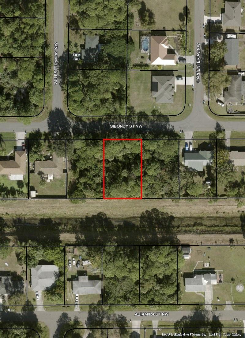 Great opportunity to own a residential lot in Palm Bay! This 0.23-acre lot provides plenty of space to build your future home or add to your investment portfolio. Located in a growing area with convenient access to shopping, schools, major roads, and all that Palm Bay has to enjoy. No HOA. Drive by and envision the possibilities this property has for you! Buyer and buyer’s agent are responsible for verifying all information, including zoning, utilities, environmental conditions, and building requirements with the appropriate authorities.