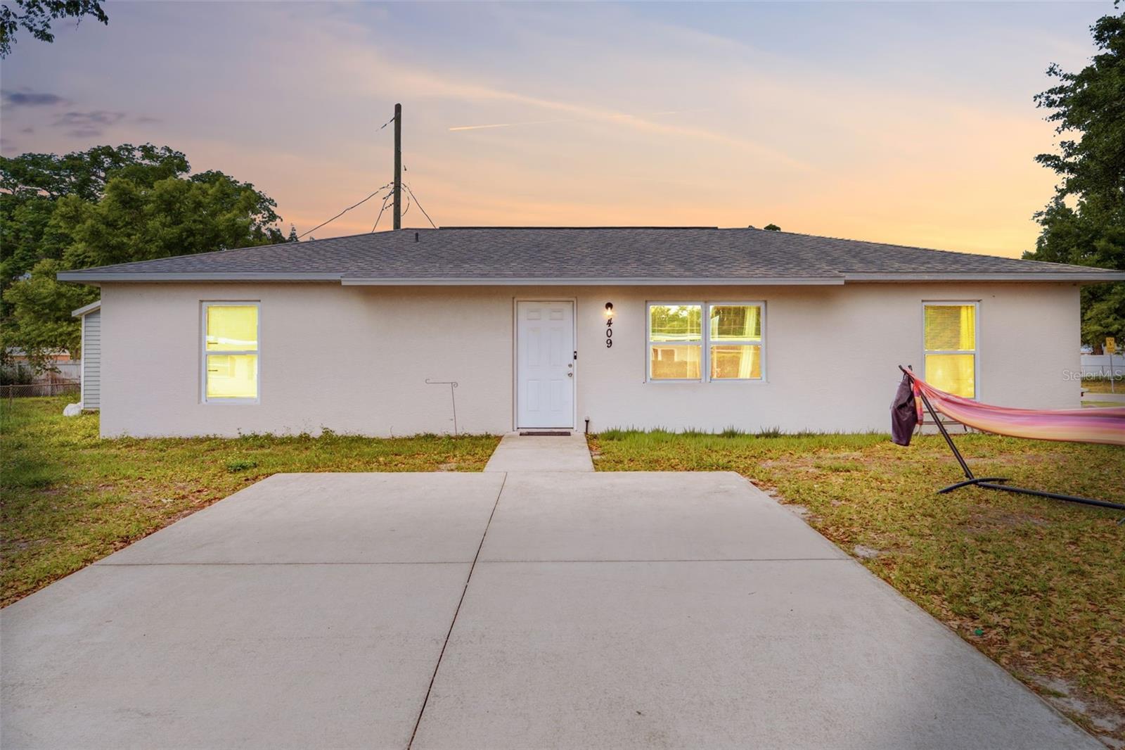 Welcome home to this beautifully maintained 2022-built concrete block home located within the city limits of Arcadia, all for UNDER $250,000! Featuring 3 bedrooms and 2 bathrooms, this home offers modern construction, a desirable open floor plan, and generously sized rooms throughout. The spacious kitchen boasts stainless steel appliances, a center island, and plenty of room for gathering and entertaining. A split-bedroom design provides added privacy, while the inviting living spaces offer comfort and functionality for everyday living. Enjoy the durability of concrete block construction and the convenience of being just minutes from local shopping, dining, schools, and everyday essentials. Whether you’re a first-time homebuyer, looking to downsize, or searching for an investment opportunity, this home delivers modern features, a convenient location, and exceptional value. Three bedrooms, two bathrooms, newer construction, and city convenience—all for under $250,000!
