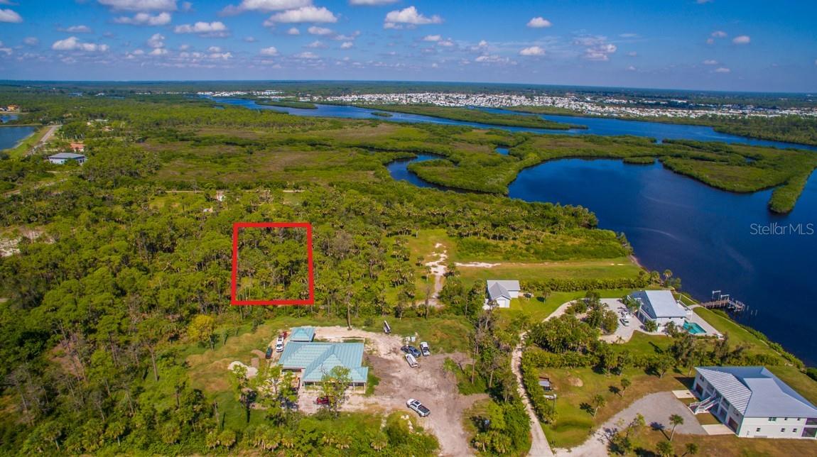 Imagine the freedom to design your own private waterfront retreat—nestled along a tranquil canal that leads directly to the Myakka River and the Gulf of Mexico through the El Jobean Bridge. This 1.0375-acre parcel on Deer Court in Venice offers approximately 153 feet of canal frontage -- perfect for boating enthusiasts seeking Gulf access and tranquil water views. No HOA. No CDD. Just the serenity of the water and the lifestyle that comes with it. Electricity is nearby, and a private well and septic system will be required. The possibilities are endless—build your dream home, add a boat dock, or develop for future investment. Located less than 15 miles to the Venice Beach and Manasota Key Beach. This is your chance to create a legacy property that combines tranquility, convenience, and adventure. Located near Wellen Park, Myakka Pines Golf Course, Myakka State Forest trails, and CoolToday Park—home of the Atlanta Braves—this canal-front lot is a rare opportunity to own a piece of waterfront paradise in a rapidly developing area. Additional parcels available under MLS# A4670049 and A4670056.