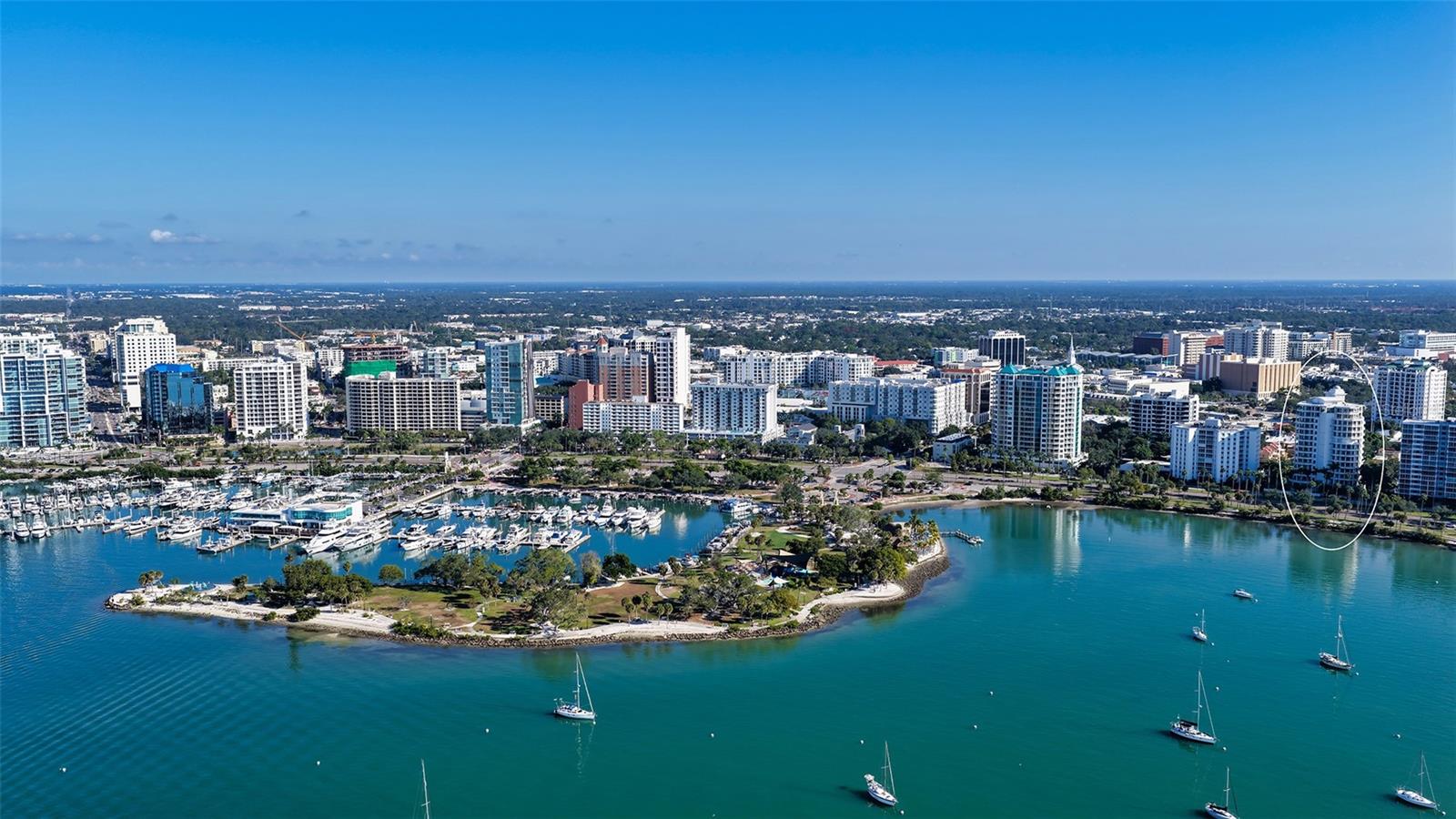 Virtually Staged. Water views take center stage in this rarely available residence at Tessera, ideally positioned on Renowned Palm Avenue in the heart of downtown Sarasota. Offering 3,315 square feet of refined living space, this exceptional condominium combines Sarasota Bay views, remarkable privacy, and an enviable downtown location.
Tessera is prized for its quiet, serene setting while remaining effortlessly connected to the energy of downtown. With just 24 private residences and only two residences on this floor, the building offers an elevated sense of privacy with no shared common walls.
The thoughtfully designed split-bedroom floor plan features a private office near the gallery entry, Three en-suite bedrooms, including an expansive primary retreat. The spacious primary suite showcases water views and direct access to the terrace with  an oversized walk-in closet, and a additional walk-in closet within one of the 2 primary baths.
The Great Room is wrapped in floor-to-ceiling glass, capturing Sarasota's ever-changing coastal beauty and creating an effortless connection to the spectacular bay view wraparound terrace. Extending from the Great Room to the kitchen, the terrace provides an exceptional setting for morning coffee, sunset entertaining.
The interior includes immaculately refinished kitchen cabinetry, quartz countertops open-concept kitchen with kitchen dining nook, new backsplash and modern hardware. The office/ den with custom high-end cabinetry provides an ideal space for work or relaxation. A private entrance to one of the en-suite bedrooms offers flexibility for guests, or live-in assistance.
Additional conveniences include a private on-floor storage room and building-wide water detection system. Tessera's fully updated 2024 amenities include a heated 60-foot pool with sun deck, whirlpool spa, and state-of-the-art fitness center. The lobby and community spaces have also been beautifully redesigned by JKL Design. A pet-friendly building, Tessera additionally offers a grilling area and bicycle storage.
Step outside and experience the best of downtown Sarasota. Located just steps from Main Street, Burns Court, the Bayfront, and Marie Selby Botanical Gardens, Tessera places shopping, galleries, dining, arts and culture, and waterfront recreation at your doorstep. Enjoy an easy walk or bike ride across the Ringling Bridge, or convenient access to St. Armands Circle and Lido Beach.
A rare opportunity to experience expansive water views, exceptional privacy, polished interiors, and effortless downtown Sarasota living from one of Palm Avenue's most desirable addresses.