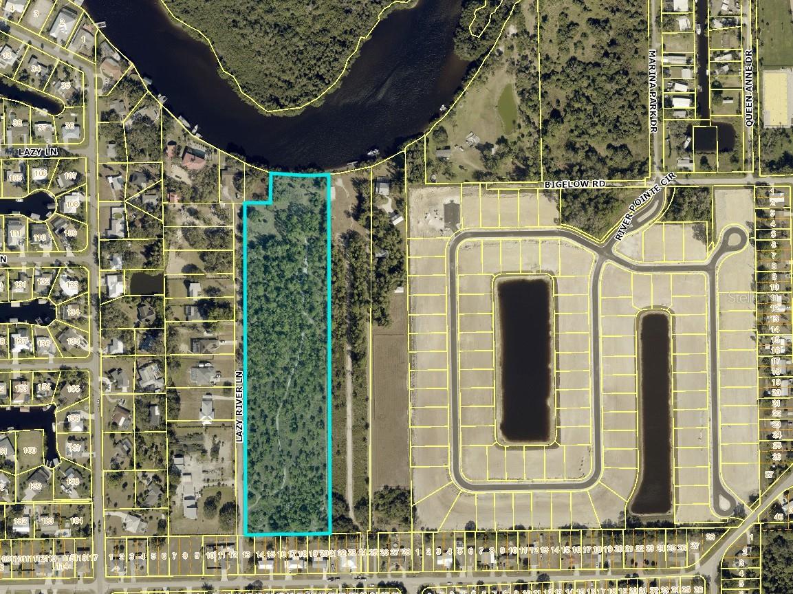 Exceptional 10-acre riverfront opportunity on the Caloosahatchee River in Fort Myers, offering approximately 320 feet of direct waterfront below the Franklin Lock with unrestricted boating access to the Gulf of Mexico. Surrounded by majestic oaks and pines, this rare property combines breathtaking river views, exceptional privacy, and outstanding investment potential. Currently zoned RS-1 Suburban, the property offers the potential to develop up to 60 residential units, subject to county approvals and infrastructure requirements, making it an extraordinary opportunity for developers, investors, and builders seeking to create a premier waterfront community. Plans could include premium riverfront homesites with private dock potential, while additional residences may enjoy river access through a community boat ramp and dock. Central water and sewer are available, further enhancing the property's development appeal. For those seeking a private estate, this remarkable property provides the perfect setting to create a custom riverfront retreat with ample room for barns, garages, workshops, guest houses, and other outbuildings while preserving the natural beauty of the landscape. A private boat ramp may also be added, and the protected waterfront location behind an oxbow island helps shield boats and docks from heavy wave action. A generous 25-foot building setback from the river's edge allows future construction to maximize the spectacular water views and embrace the ultimate Southwest Florida waterfront lifestyle. Parcel 20-43-26-02-00002.0010 is included in the sale. Opportunities of this size, location, flexibility, and development potential are exceptionally rare on one of Southwest Florida's most desirable waterways.