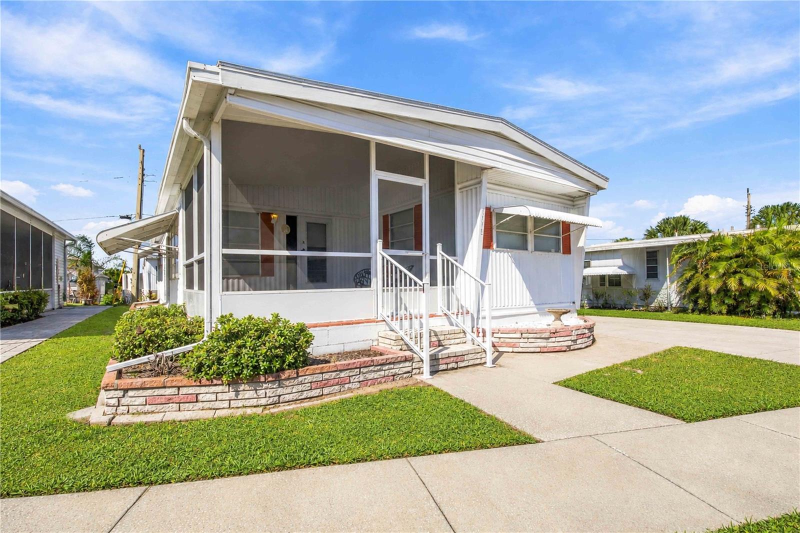 Come and Enjoy the Florida Lifestyle in Tri-Par Estates! Welcome to Tri-Par Estates, a desirable 55+ community offering an active lifestyle and a convenient Sarasota location. This 2-bedroom, 2.5-bath home features approximately 836 square feet of living space, plus a bonus room that can serve as a Florida Room, home office, or den. There is a nice-sized laundry room that has a workbench plus a shower stall and sink. The property is being sold furnished, helping to make your move a little more convenient. Residents enjoy an impressive selection of community amenities, including a swimming pool and spa, tiki hut, pickleball courts, fitness center, shuffleboard, miniature golf, and horseshoes. The recreation facilities offer ping-pong, billiards, card tables, sewing areas, a kitchenette, and additional gathering spaces. The expansive clubhouse hosts regular dinners, dances, and social events, making it easy to stay active and connected. Located just minutes from downtown Sarasota, you'll be close to shopping, restaurants, marinas, museums, Sarasota-Bradenton International Airport, and the beautiful beaches of Siesta Key and Lido Key. Tri-Par Estates is a land-owned community, so you own your property and the land beneath it. There are no separate HOA fees; the annual district fee of $1,648 is included in the property taxes and includes internet and TV. The community is also golf cart-friendly, with optional RV and boat storage available when space permits. If you're looking for an affordable way to enjoy the Florida lifestyle with plenty of amenities, activities, and convenient access to Sarasota's attractions, this home in Tri-Par Estates is worth a look!