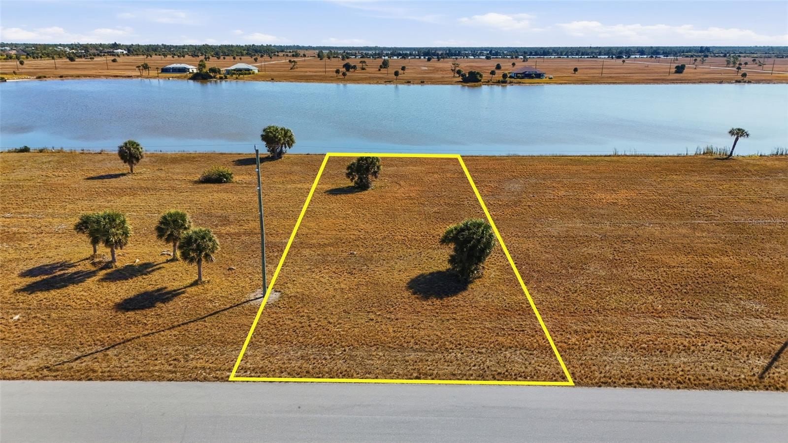 Build your Florida dream home on this exceptional .41-acre lakefront lot in the peaceful community of Rotonda Meadows. Offering extra space and flexibility, this oversized homesite provides the perfect canvas for a custom residence. Need a builder? Let us introduce you to reputable local builders. Enjoy tranquil water views right from your backyard, where you can relax and take in the natural beauty and abundant wildlife. Rotonda Meadows is a deed-restricted neighborhood known for its quiet streets, well-maintained surroundings, and convenient location. Just a short drive to area beaches, boating, golf courses, shopping, and dining, this property offers the ideal balance of serenity and accessibility.