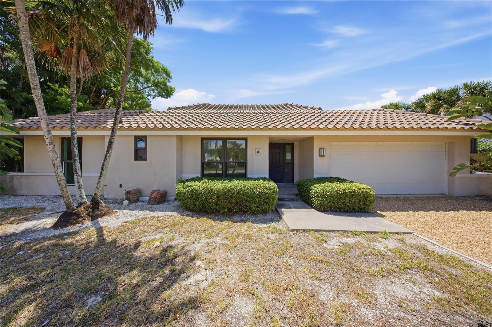 Discover an exciting opportunity in Sanibel's Beachview Country Club Estates! Situated along the scenic Sanibel River, this single-story, 3-bedroom, 2-bathroom residence offers 1,644 square feet of living space, a split-bedroom floor plan, a separate den, and an attached two-car garage. Extensive interior renovations have already transformed much of the home, featuring attractive wood-look tile flooring, fresh neutral finishes, updated interior doors, contemporary framed sliding glass doors, and beautifully tiled walk-in shower areas. Spacious living areas and large windows bring in abundant natural light, while the screened pool area creates a wonderful setting for enjoying the surrounding tropical landscape. With much of the renovation work already completed, the property offers its next owner the opportunity to finish the remaining improvements and personalize the final details. Located in an established Sanibel neighborhood near beaches, golf, dining, and recreational opportunities, this waterfront property combines a desirable island location with the potential to create something truly special. Schedule your private showing and explore the possibilities!