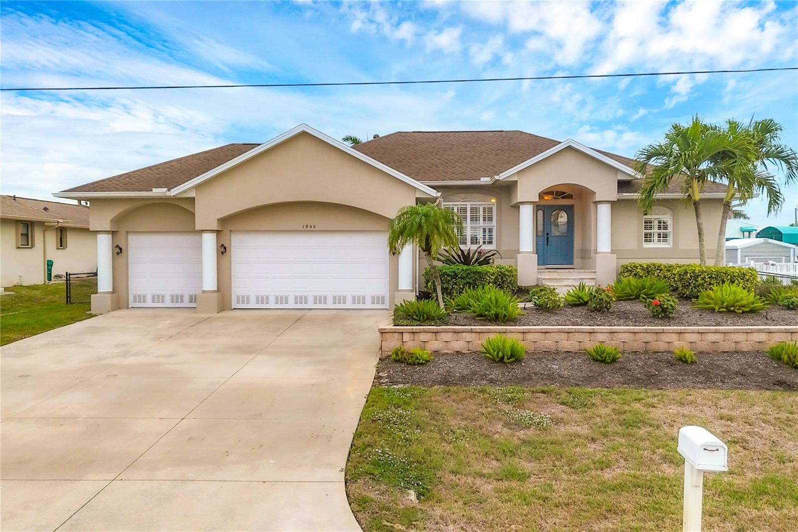 Waterfront living at its finest! This beautifully maintained ELEVATED WATERFRONT POOL home has three bedrooms,  two baths and has NEVER FLOODED in any local hurricanes, offering peace of mind along with exceptional coastal lifestyle appeal. The home features a new roof, new water heater, and hurricane impact rated windows throughout for added protection and efficiency. Inside, you will find fresh paint, durable and stylish tile flooring, elegant, plantation shutters, and solid surface countertops in the kitchen. Perfect for both every day, living and entertaining. Step outside to your private retreat. The home features an elevated pool that is 9.5 feet above ground level. It features a relaxing waterfall and is complete with a new pool pump, creating a true resort style atmosphere. The property is fully equipped with lawn irrigation, keeping the landscaping lush year round. Boaters will love the 10,000 pound Boat Lift with a brand new cover, providing direct access from your backyard. Situated on a scenic saltwater canal with direct access to Lemon Bay, you are just a short five minute NO BRIDGE boat ride to Stump Pass and the Gulf. Offering world-class fishing, boating, and stunning Coastal Waters. Start your coastal life in paradise with the top down! A Red Mustang Convertible is available for separate purchase- the perfect way to cruise into your next chapter! Don’t miss this exceptional waterfront opportunity. Schedule your private showing today!