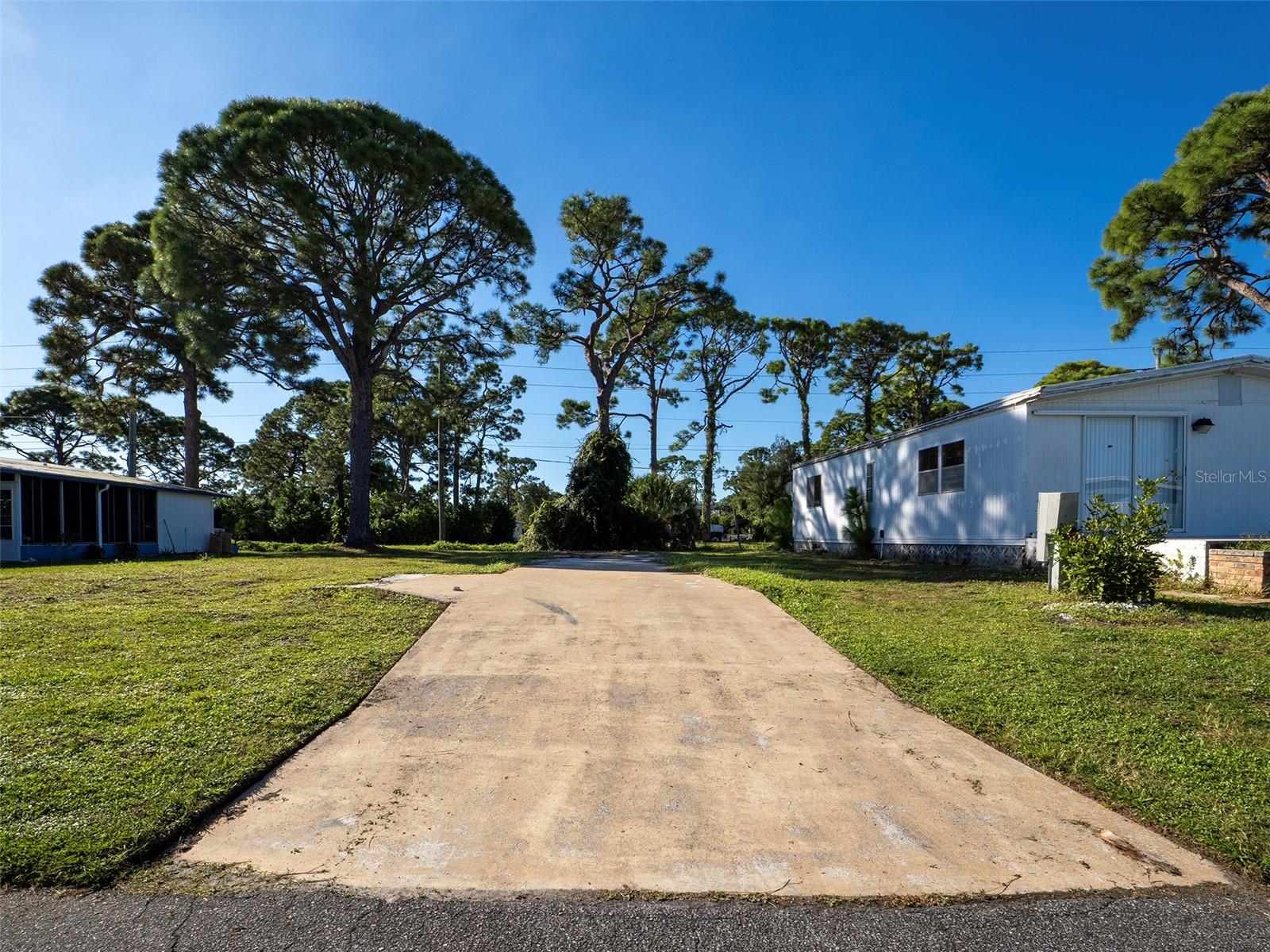 Build your Florida getaway in Polynesian Village, a sought-after resident-owned 55+ community just 1.3 miles from Manasota Key Beach. This vacant lot is ready for a new home and offers a great opportunity to enjoy the Gulf Coast lifestyle. The community features a screened pool, a Tiki Hut with a thatched roof and concrete floor, and a large pond, providing a welcoming setting for social gatherings and community events. A dedicated storage area for boats, trailers, and recreational vehicles is available. Enjoy easy access to Manasota Key Beach for swimming, fishing, and spectacular sunsets, as well as nearby beaches in Englewood, Venice, and Boca Grande. Shopping, restaurants, and golf courses are also conveniently close by. Come discover the relaxed coastal lifestyle and friendly community atmosphere of Polynesian Village!