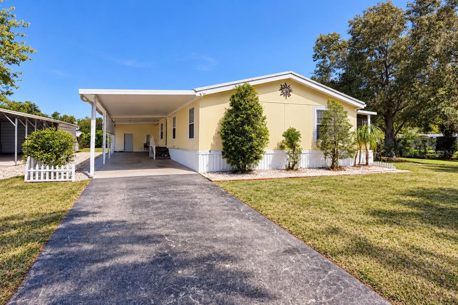 Discover the space, comfort, and potential of this well-sized manufactured home! Featuring 3 bedrooms, 2 full bathrooms, and two generously sized living rooms, this property offers a versatile layout with plenty of room for everyday living, entertaining, and relaxing.

The home features a large, spacious kitchen with plenty of room to prepare meals and gather with family and friends. The two separate living areas provide added flexibility, whether you envision a formal living room, a family room, a game room, or an additional space for entertaining guests.

Step outside and enjoy the back porch, an inviting spot to relax, sip your morning coffee, or unwind in the evening while taking in the outdoor surroundings. Situated on a generous half-acre lot, the property offers ample outdoor space with endless possibilities for gardening, outdoor recreation, pets, and entertaining.

For added convenience, the property includes a two-car carport with covered parking for two vehicles, along with RV hookups, providing extra convenience for RV owners and travelers.

With its spacious layout, generous lot, and versatile features, this property offers plenty of room to make it your own!