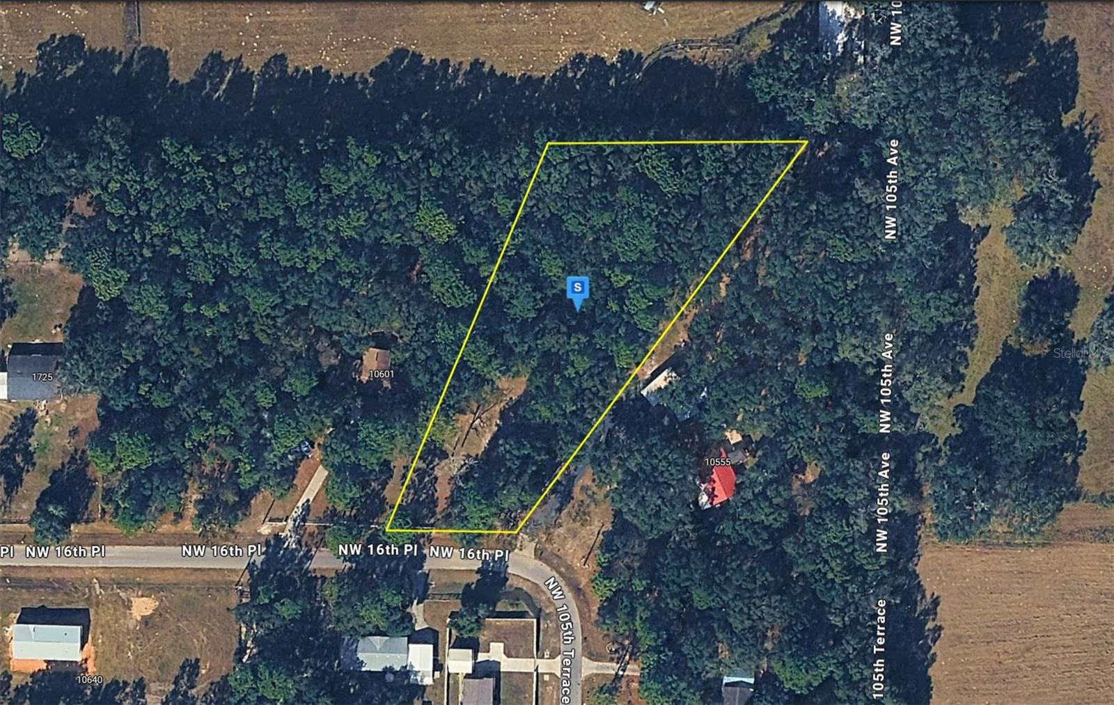 This 1.75-acre residential lot in the Ocala area of Marion County, Florida, offers a peaceful setting in a quiet neighborhood with no HOA restrictions. Featuring flat, wooded terrain, the property provides a natural setting with plenty of space for your future plans. Well and septic are needed, while power is available, providing added convenience for future development. Conveniently located near local amenities, shopping, dining, outdoor recreation, and major roadways, the property offers easy access to nearby communities and everyday conveniences. This vacant lot presents an excellent opportunity to build your future home or make a smart investment in a peaceful Ocala location. Listing is for land only and comes As Is. Street addresses can be for listing purposes only and vacant land will receive a true street address once improved.