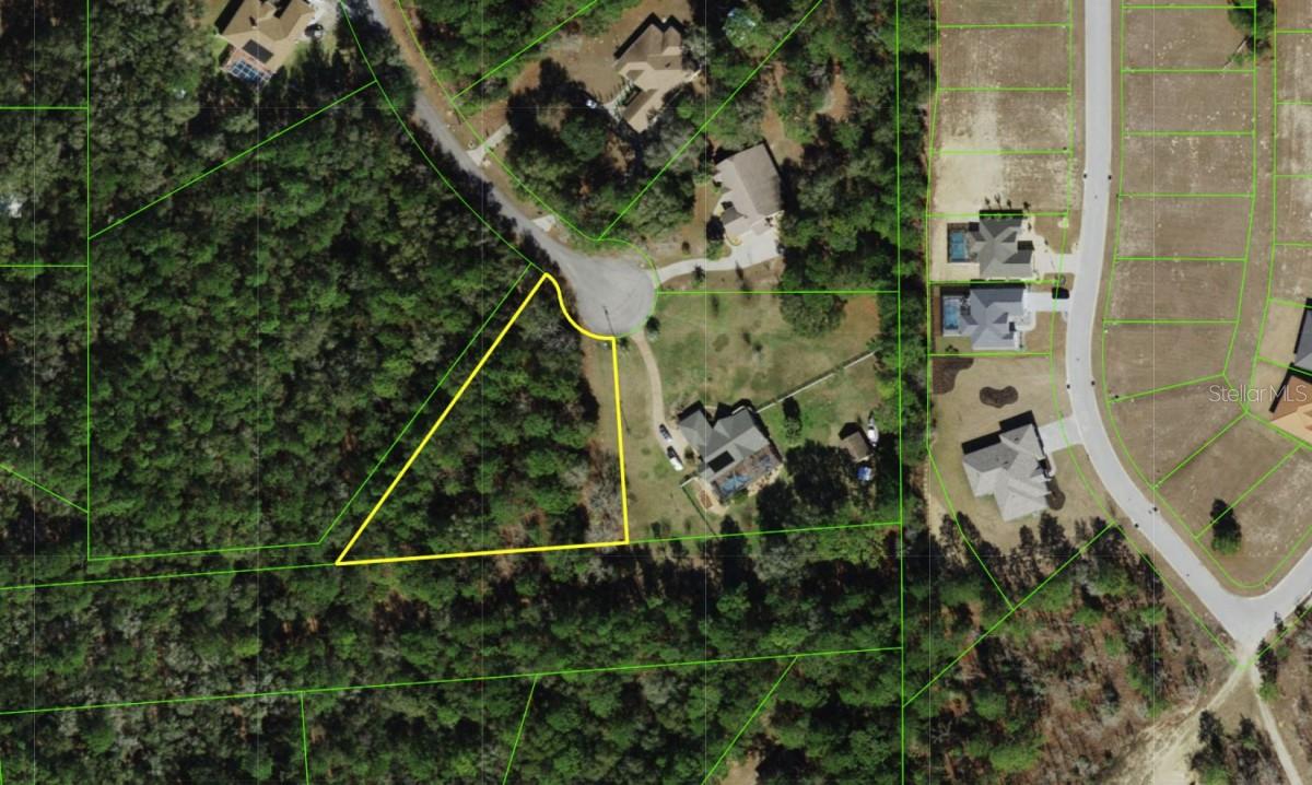 Custom home site in Rainbow Springs Forest.

Positioned on a tranquil cul-de-sac, this 1.02-acre wooded parcel delivers exceptional privacy in one of the area’s most desirable neighborhoods. Design the residence you have always envisioned amidst a lush, natural backdrop of mature trees and low-traffic surroundings.

Property owners enjoy an incredible value with an HOA fee per year, granting access to a private resident-only river park on the Rainbow River, a resort-style pool, clubhouse, fitness center, tennis and pickleball courts, and an on-site restaurant. Situated with unbeatable convenience, this lot offers a quick drive to Dunnellon, Ocala, the World Equestrian Center, Juliette Falls Golf Course, and I-75.