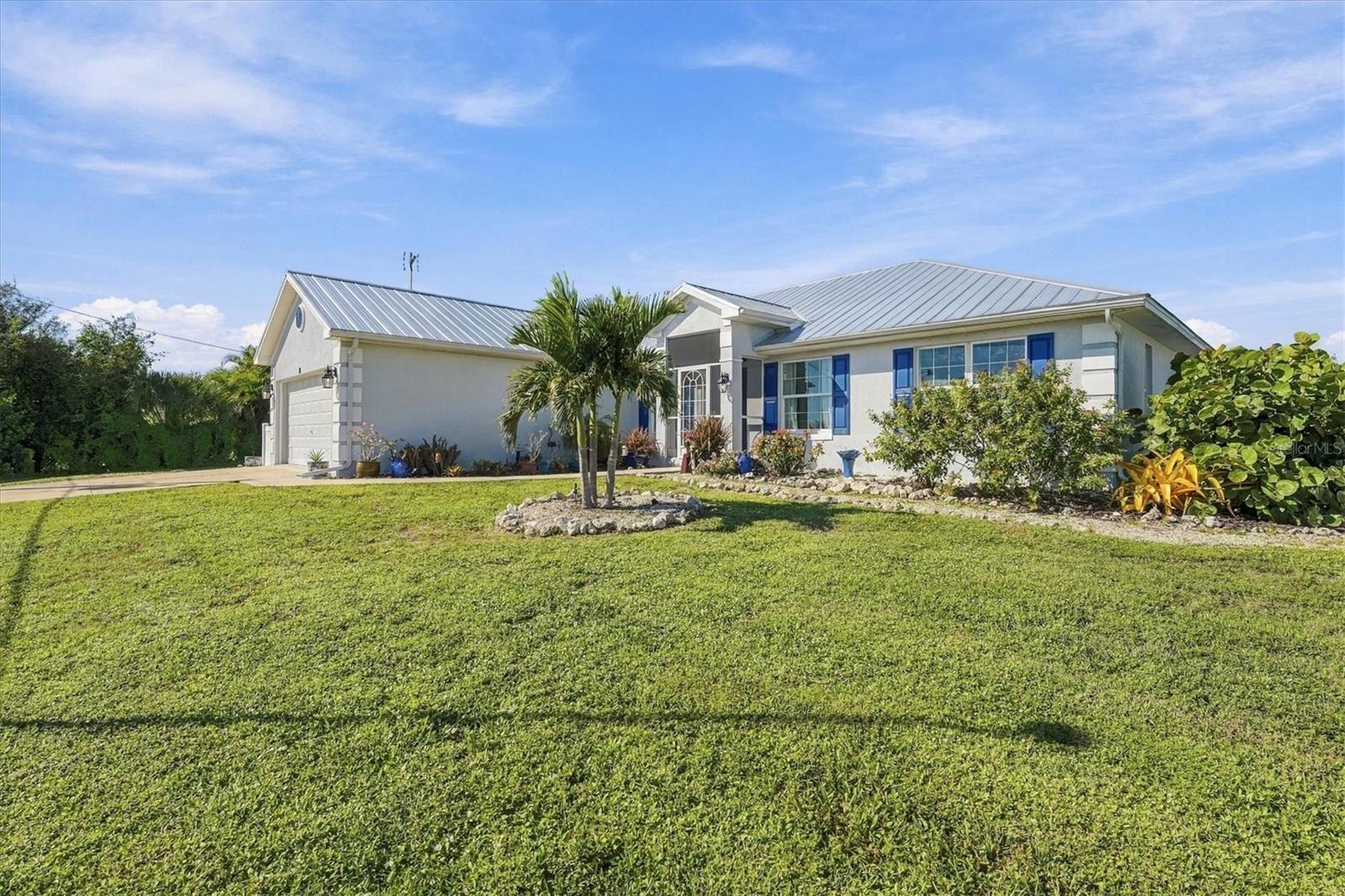 COASTAL LIVING, CANAL VIEWS, PRIVATE POOL & A FREE BOAT INCLUDED! Welcome to your own slice of Florida paradise in the desirable Pebble Beach section of Rotonda West! Built in 2015, this beautifully maintained 3-bedroom, 2-bath home offers 1,839 square feet of comfortable coastal living, complete with a separate den/office and bonus room that provide the flexibility for up to FIVE bedrooms! Step inside and enjoy the inviting nautical-inspired décor, open-concept floor plan, and easy-care tile flooring throughout. The spacious kitchen features beautiful quartz countertops, a built-in pantry, breakfast bar, and plenty of room for gathering with family and friends. The split-bedroom design offers privacy, while the primary suite features an en-suite bath with dual sinks and a generously sized walk-in shower.

Step outside to experience what Florida living is all about! The expansive screened lanai overlooks a sparkling recently resurfaced gunite pool, with peaceful canal views providing the perfect backdrop for morning coffee, afternoon swims, and relaxing evenings. The patio has also been recently resealed, creating a fresh, inviting outdoor entertaining space. Just beyond the pool, your private dock awaits—and here's the BONUS: A BOAT IS INCLUDED WITH THE SALE! Whether you're heading out for a leisurely cruise, casting a fishing line, or simply enjoying the waterfront setting, this property makes it easy to embrace the Florida lifestyle.

Additional highlights include a newer metal roof, solid block construction, a two-car garage, and a thoughtfully designed floor plan offering plenty of flexibility for guests, hobbies, or working from home. Located in the popular deed-restricted community of Rotonda West, residents enjoy access to multiple golf courses, parks, walking & biking trails. Just a short drive to the beautiful Gulf beaches of Manasota Key and Boca Grande, along with fantastic local dining, shopping, and entertainment.