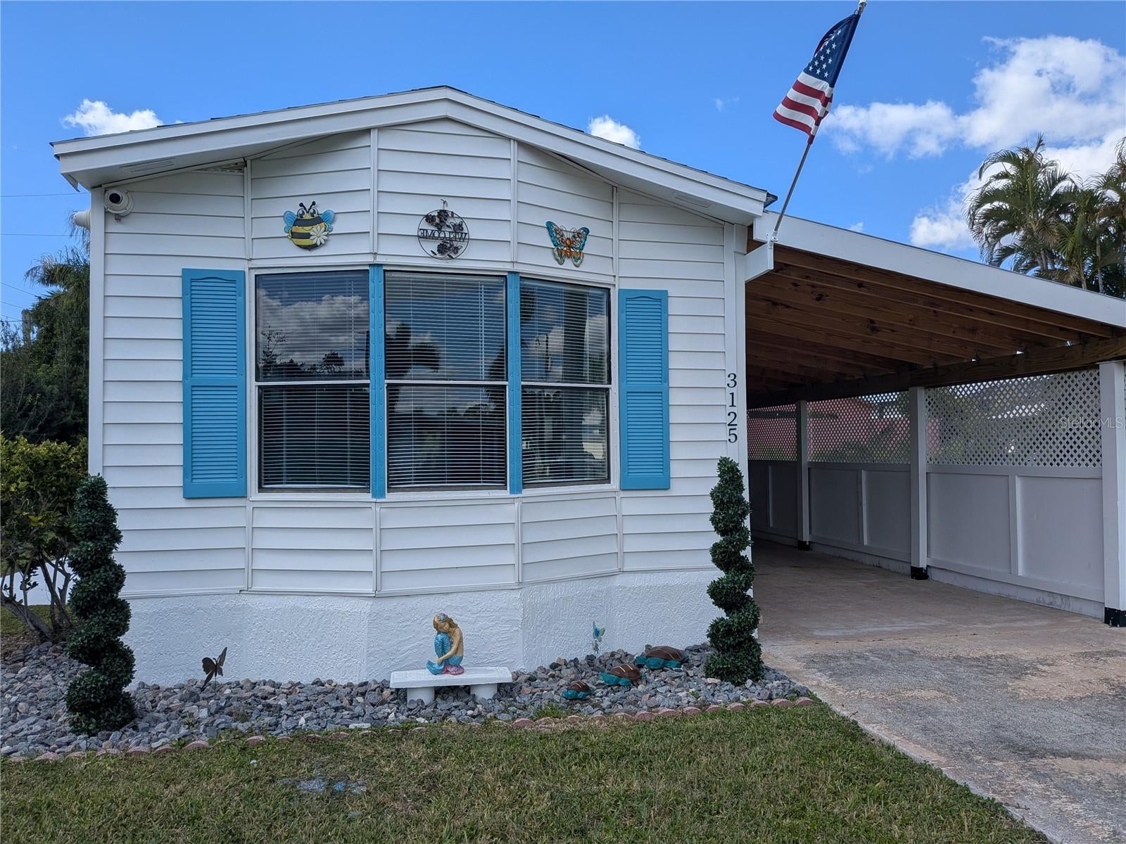 One or more photo(s) was virtually staged. Freshly remodeled and ready to impress—your Punta Gorda sunshine retreat is calling! This inviting 2-bedroom, 2-bath manufactured home delivers fresh style and everyday comfort, all with the freedom of owning your own land and having NO HOA FEES!
Step inside to discover NEW laminate flooring throughout and fresh paint that gives the interior a bright, welcoming feel. The kitchen shines with NEW stainless steel appliances, ready for everything from leisurely breakfasts to preparing your favorite meals. A NEW washer and dryer add even more convenience, making it easy to settle in and start enjoying your next chapter.
Whether you’re looking for a year-round residence or a seasonal escape, this home offers a wonderful place to unwind. The approximately 5,985-square-foot lot provides space to create your own outdoor retreat—picture morning coffee, colorful planters, and relaxing evenings beneath the Florida sky.
Located in Charlotte Park, you’re close to Punta Gorda’s waterfront dining, shopping, parks, golf, and recreation. With fresh updates, new appliances, new flooring, and land to call your own, this gem deserves a spot on your must-see list. Schedule your showing today and make your Florida dream a reality!
