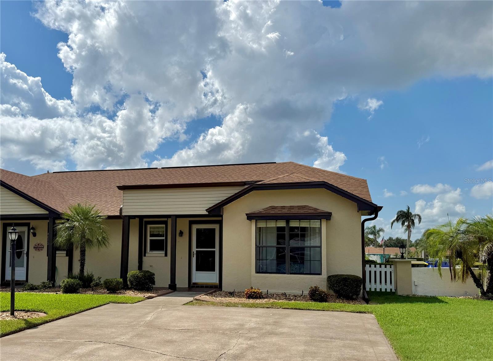 Welcome to easy, low-maintenance living in the desirable Sun ’n Lake community! This bright and inviting 2-bedroom, 2-bath villa is being offered furnished and ready for its next owner. The home features a bright kitchen with plenty of cabinet space and multiple options for dining and entertaining. Enjoy meals in the formal dining room, relax around the table in the air-conditioned lanai, or dine outdoors on the paver patio while taking in the peaceful views of the community common area. The thoughtfully designed split-bedroom layout offers privacy for both owners and guests. The spacious guest suite can be closed off with a pocket door, creating a private retreat for visiting family and friends. The primary suite features a walk-in closet, and both bathrooms include walk-in showers for convenience and accessibility. Natural light fills the home, creating a bright and comfortable atmosphere throughout. Additional features include indoor laundry and a separate utility/storage room, providing plenty of extra space. Located in a quiet area toward the end of the community, this villa enjoys beautiful views of the common area with the community pool conveniently nearby. The HOA fee is approximately $1,100 per quarter and provides exceptional value, covering lawn care, irrigation, landscaping, exterior insurance, roof, community pool and common areas, and interior and exterior pest control—making this a truly low-maintenance lifestyle. Country Club Villas is not a 55+ community, so all ages are welcome. Pets are also permitted, subject to community restrictions. One of the highlights of living in Sun ’n Lake is the abundance of recreational amenities right within the community. Sun ’n Lake is well known for its two 18-hole golf courses, along with the Island View Restaurant, pickleball courts, community pool, and more! Whether you enjoy an active lifestyle, a round of golf, or simply relaxing close to home, there is something for everyone to enjoy. The location also offers outstanding convenience with a short commute to the hospital, doctors’ offices, restaurants, shopping, and other everyday necessities. Whether you're looking for a full-time residence, seasonal Florida getaway, or an easy-care second home, this furnished villa offers comfort, convenience, recreation, and a relaxed Florida lifestyle. Schedule your showing today!