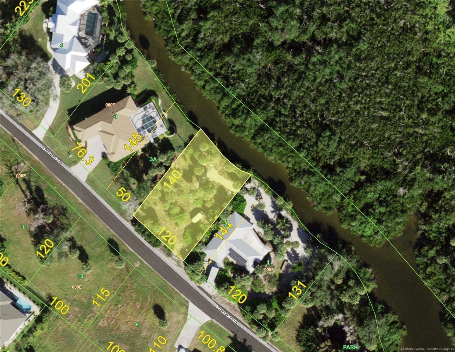 WATERFRONT property on Amberjack Creek leading to the Gulf! Create your own tropical oasis. It is hard to guess from this oversized property how convenient a location this really is - just minutes to the Placida Publix Complex for your everyday grocery, banking and post office needs. If you are craving a walk on one of the most beautiful beaches in the world then take a 6 minute drive to the Boca Grande Causeway. As you cross over to the island the scenery is spectacular – gorgeous turquoise water melts into the distant horizon. Ready for a bit of adventure - take your boat out for a wonderful day on the water or just fish from your own rear garden. Adjacent home is for sale separately on close to a 1/2 acre on the water.