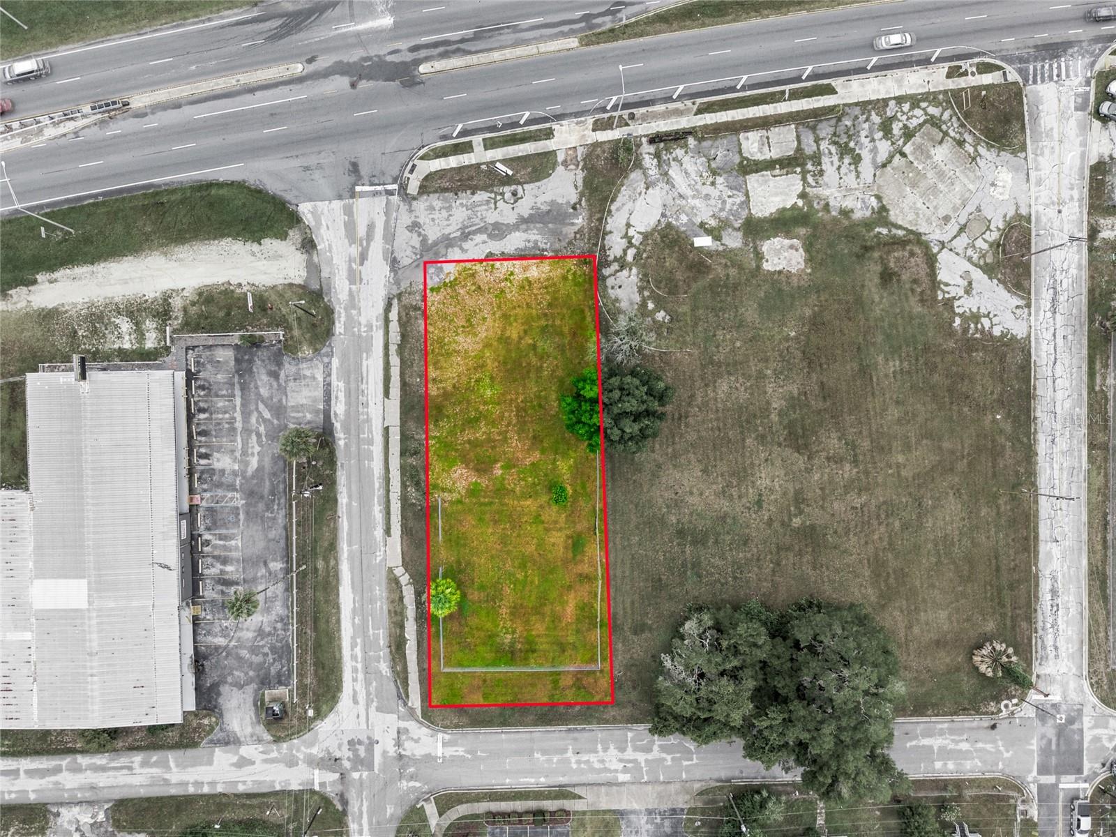 Unlock prime visibility and flexible development potential with this B-4 zoned commercial land. Consisting of two adjacent lots totaling approximately 0.38 acres, this cleared, in-town site sits just off N Pine Ave/US 441 in the gateway to Downtown Ocala, placing your business minutes from major corridors, dense residential neighborhoods, and established retail.