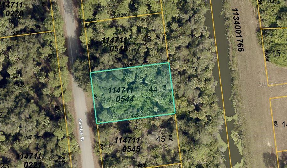 Build your Southwest Florida dream with freshwater canal frontage on Sernice Street in North Port! This residential homesite offers a peaceful waterfront setting where you can plan a home that makes the most of the view. Imagine morning coffee on your future lanai overlooking the canal, afternoons watching local wildlife, and evenings relaxing beside the water as the sky changes color. The canal adds an inviting natural backdrop and a sense of openness to your outdoor living space—an ideal starting point for creating your own Florida retreat. Whether you’re ready to build now, planning for the future, or seeking land as a long-term investment, this Sarasota County property offers an appealing combination of waterfront scenery and access to everyday conveniences. Explore North Port’s shopping, dining, parks, and recreation, with Tamiami Trail and I-75 providing connections to destinations throughout Southwest Florida. Fill your weekends with Gulf Coast beach outings, fishing adventures, golf, or a visit to historic downtown Punta Gorda for waterfront dining and local events. Bring your vision for a custom home, inviting outdoor spaces, and a lifestyle centered around sunshine and water views. Take the first step toward your future on this freshwater canal homesite today! Buyer to verify zoning, utilities, flood zone, environmental conditions, setbacks, and building requirements.