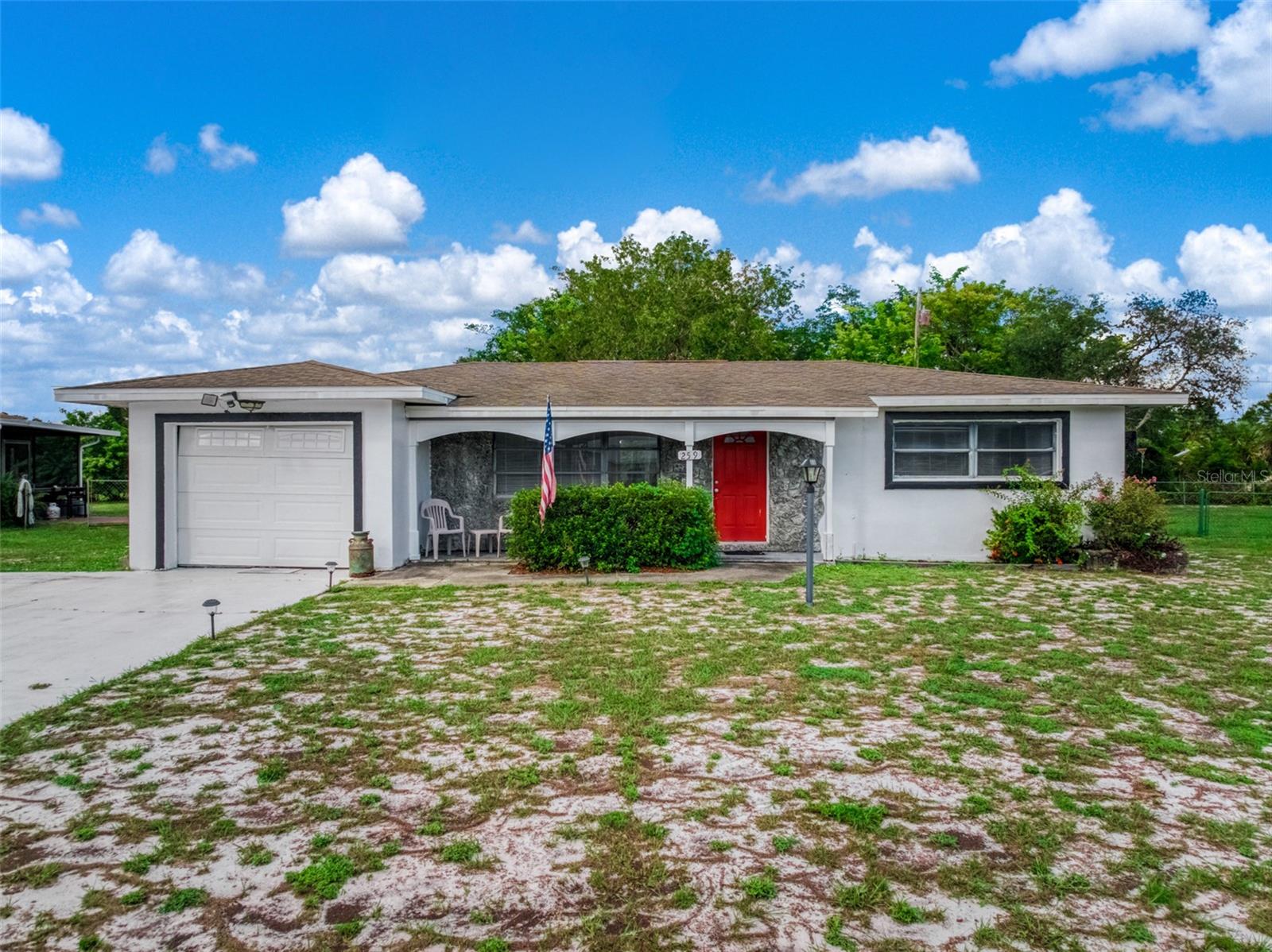 Welcome to this charming 2-bedroom, 1-bath home in desirable Placid Lakes! Painted inside and out, this move-in-ready home features tile flooring throughout, a 2024 roof, A/C installed in 2020, a sprinkler system, and an oversized driveway offering plenty of additional parking space Enjoy Florida living from the newly screened back porch, plus an additional concrete patio perfect for BBQs and outdoor entertaining. The fenced backyard offers plenty of space to relax and enjoy. Looking for even more possibilities? The vacant lot directly behind the home at 254 Loquat Rd NW is currently offered for sale separately by another owner. Just a short drive from Tobler Park, featuring a gated recreation area with playground, pavilions, BBQ facilities, and a boat ramp providing access to beautiful 3,500-acre Lake June. Placid Lakes also offers a voluntary HOA with clubhouse access. Come see all this home and community have to offer!