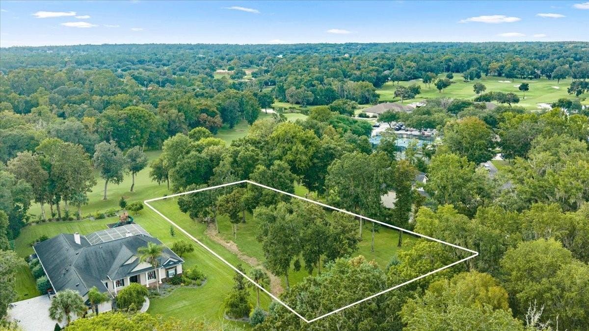 GOLF COURSE FRONTAGE ON THE 18TH HOLE OF THE COUNTRY CLUB OF OCALA! Discover an exceptional opportunity to build on this improved 1.01-acre homesite, ideally positioned within the gated Country Club of Ocala. Located directly along the 18th hole and convenient to the community pool, fitness center, recreation and amenities, this homesite combines a prime location with substantial improvements already completed.

The property has been cleared, landscaped and irrigated with sod, shrubs and trees, along with a new irrigation well and dedicated electrical service. With approximately 150 feet of frontage and 293 feet of depth, the property provides over an acre for the design and construction of a custom residence while taking advantage of its golf course setting. The established landscaping, irrigation and infrastructure provide a valuable head start compared with an unimproved parcel.