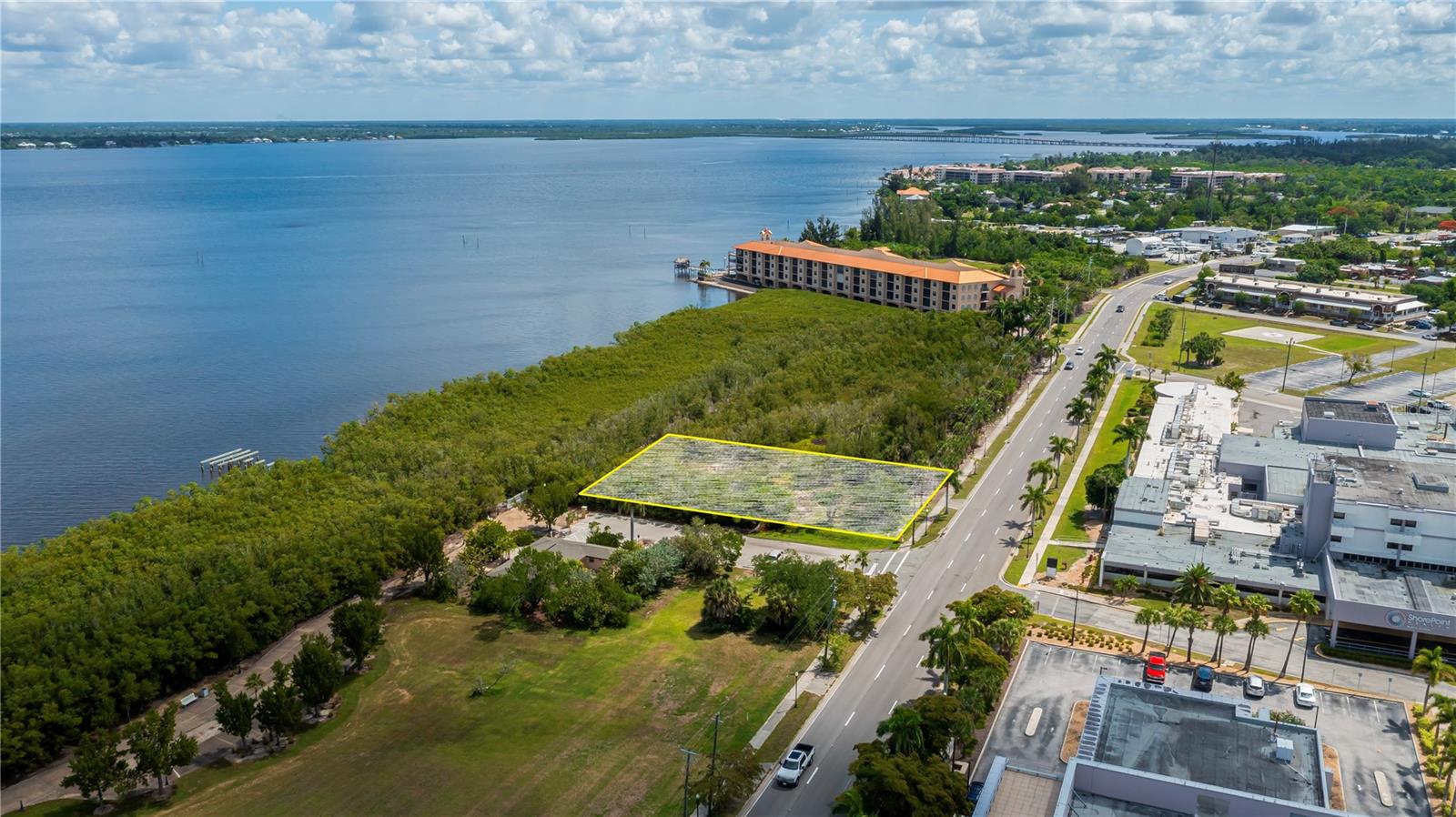 RARE INVESTMENT & DEVELOPMENT OPPORTUNITY IN THE HEART OF PUNTA GORDA! Discover the incredible potential of this approximately 0.42-acre property, ideally situated at the corner of E Marion Avenue (US-17) and Adrienne Street, just minutes from historic downtown Punta Gorda! Boasting outstanding exposure along a major thoroughfare, this strategically located parcel offers an exciting opportunity for investors, business owners, and developers looking to establish a presence in one of Southwest Florida's most desirable waterfront communities. ZONED NEIGHBORHOOD CENTER (NC), the property offers flexibility for a variety of potential uses, including professional offices, restaurants, medical offices, residential development, and other neighborhood-oriented commercial uses, subject to applicable development regulations and approvals. Envision an elevated, multi-story development designed to take advantage of potential panoramic views of the Peace River, Charlotte Harbor, and the beautiful Punta Gorda skyline! LOCATION IS EVERYTHING! Situated near the waterfront Trabue Park and Harborwalk corridor, the property offers proximity to scenic walking and biking trails, public waterfront amenities, downtown restaurants, shopping, and entertainment. The surrounding area includes substantial City-owned land associated with long-term waterfront park planning, creating an intriguing opportunity for buyers with a vision for future growth. Conveniently positioned near medical facilities and major transportation routes, with easy access to US-41 and Interstate 75, this location combines accessibility, visibility, and long-term investment potential. Whether you're envisioning a signature professional office, a distinctive restaurant, a boutique mixed-use development, or a strategic land investment, 806 E MARION AVENUE OFFERS AN OPPORTUNITY TO EXPLORE YOUR VISION IN A PRIME PUNTA GORDA LOCATION! Buyer to verify zoning, permitted uses, environmental conditions, development requirements, and feasibility of intended use.