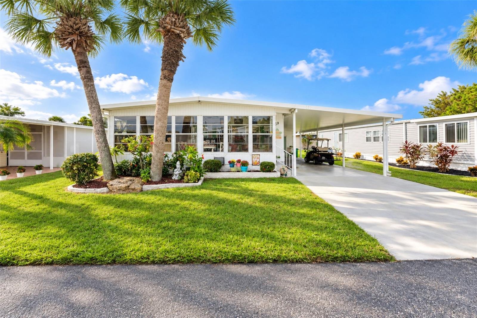 Welcome to this beautifully maintained 2-bedroom, 2-bath home, offering elegance and convenience while embracing the relaxed Florida lifestyle. From the moment you arrive, you’ll appreciate the beautiful landscaping and very spacious front lanai, creating the perfect setting for morning coffee, entertaining guests, or simply relaxing and enjoying the outdoor views. Inside, the home features luxury vinyl flooring throughout, abundant natural light, and a thoughtfully designed layout that provides a comfortable and inviting flow from room to room. Situated on an interior lot, this home offers a peaceful and desirable setting. The property comes fully furnished, making it truly move-in ready. Additional features include a 2022 A/C system, newer hot water heater, durable metal roof, and a large storage shed offering plenty of space for tools, hobbies, and additional storage. Located in the award-winning Maple Leaf Golf & Country Club 55+ community, this home showcases modern style, bringing comfort at its best. 

Enjoy resort-style living with incredible amenities including 4 heated pools, 5 tennis courts, 4 pickleball courts, mini Golf, a fitness center, woodworking shop, and over 75 activities to keep you active and engaged. The community also features 2 restaurants, 2 hot tubs, and 2 shuffleboard courts, along with an amazing golf course. Conveniently located near shopping, this is the perfect place to enjoy the Florida life! This is a wonderful opportunity to enjoy a beautifully appointed Florida home with the convenience of being ready for you from day one—just bring your suitcase and start enjoying the Paradise!!