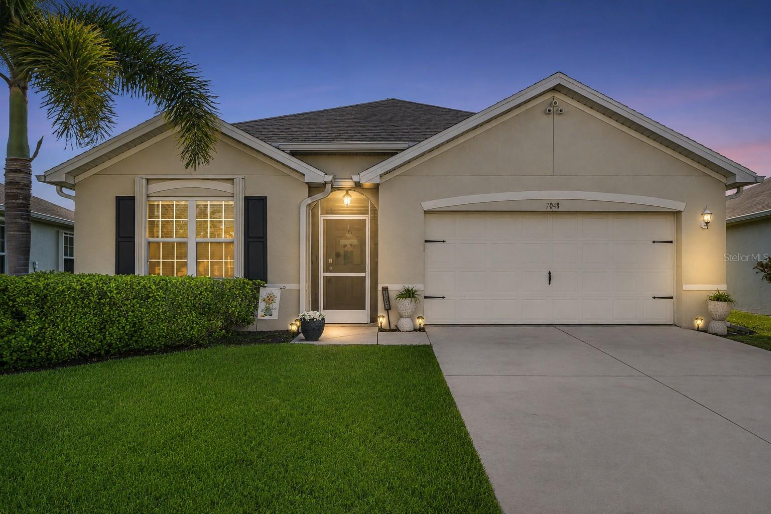Virtually Staged. Welcome to Waterford Estates, where resort-style living meets everyday peace of mind just minutes from vibrant downtown Punta Gorda. Imagine coming home to a beautifully maintained 4-bedroom, 2-bath residence designed for both comfortable daily living and effortless entertaining. The open floor plan brings everyone together, while the split-bedroom layout provides the privacy families and guests appreciate. Step onto your covered, screened lanai overlooking a tranquil pond with fountain view and enjoy one of the home's most desirable features: eastern rear exposure. Sip your morning coffee with the sunrise or unwind in the evening without the intense western sun, making your outdoor living space comfortable throughout the day. This home offers valuable updates that help you spend less time worrying and more time enjoying Florida living, including a NEW ROOF (2024), accordion hurricane shutters on every window, and full perimeter rain gutters. Beyond your front door, Waterford Estates offers the lifestyle so many buyers are searching for. Enjoy two heated pools, a clubhouse, fitness center, pickleball and bocce courts, scenic walking paths, and an active calendar of community events that make it easy to stay connected. If you've been looking for a move-in-ready home that combines low-maintenance ownership, beautiful water views, and exceptional amenities in one of Punta Gorda's most desirable gated communities, this is the opportunity you've been waiting for.