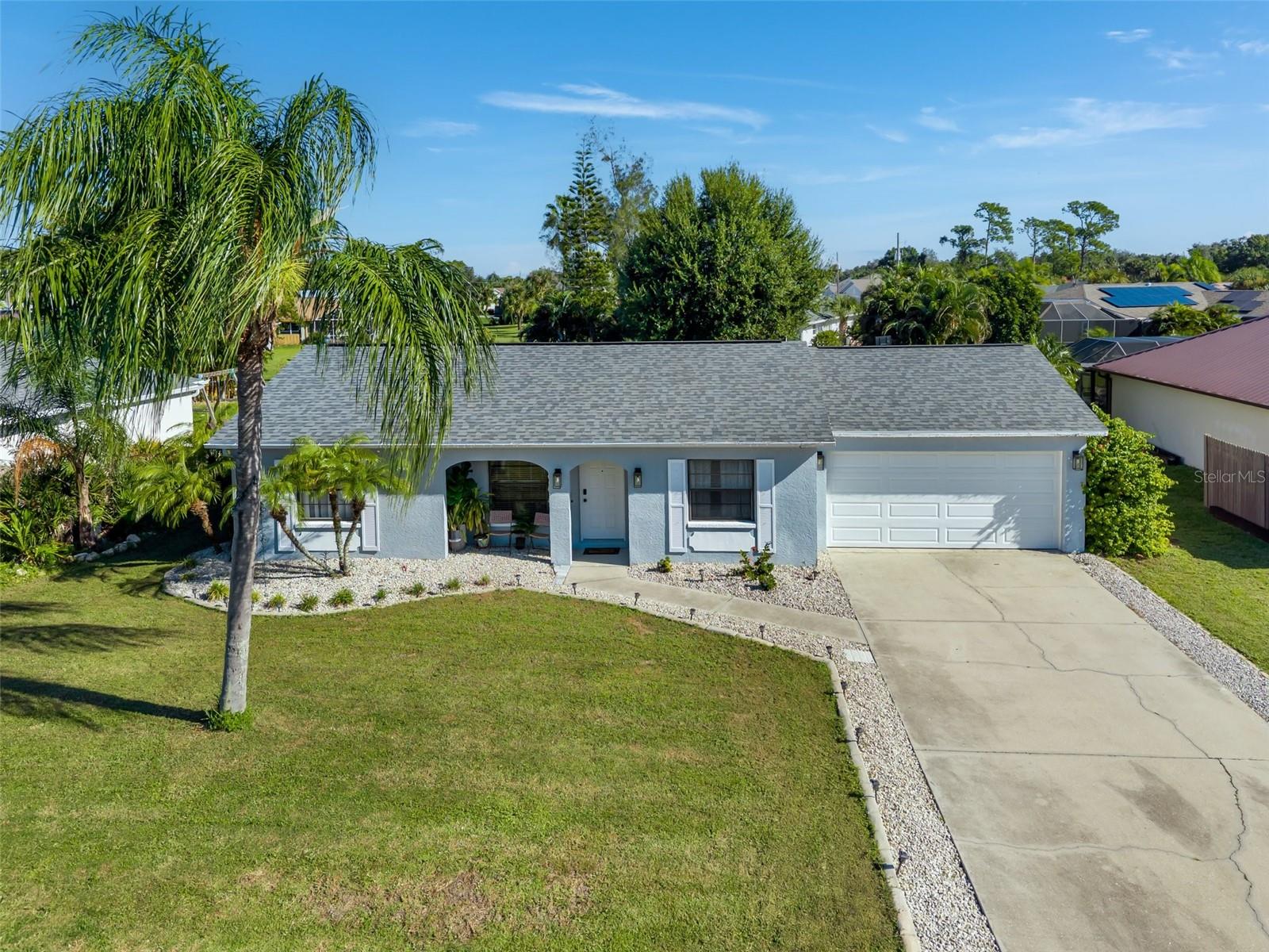 Enjoy peaceful greenbelt views and inviting outdoor space at this updated 4-bedroom, 2-bath home in the deed-restricted community of Deep Creek! Offering 1,309 square feet of living space and an attached 2-car garage, this single-story home features an open layout connecting the living and dining areas with the kitchen. Neutral tile flooring throughout the main living spaces and a soft interior color palette create a welcoming atmosphere. The kitchen features granite countertops, solid wood cabinetry, stainless steel appliances, and a new dishwasher installed in 2026. Additional updates include new ceiling fans and a second bathroom remodeled in 2025. Four bedrooms flexibility for guests, a home office, or hobbies. French doors lead to a spacious, fenced backyard with mature landscaping and greenbelt views an ideal setting for morning coffee, outdoor dining, or unwinding at the end of the day. A roof and hurricane-rated garage door installed in 2021, along with a 50-amp RV outlet in the garage, add to the home's features. Offered partially furnished, subject to an agreed-upon inventory. Conveniently located near I-75, shopping, dining, and Deep Creek Golf Club, this home offers easy access to everyday essentials and local recreation. Explore historic downtown Punta Gorda, waterfront parks, and the boating and fishing opportunities of Charlotte Harbor, all within driving distance. Punta Gorda Airport adds convenience for seasonal visits and year-round travel. Schedule your private showing and explore the possibilities of making this Punta Gorda home your own!
