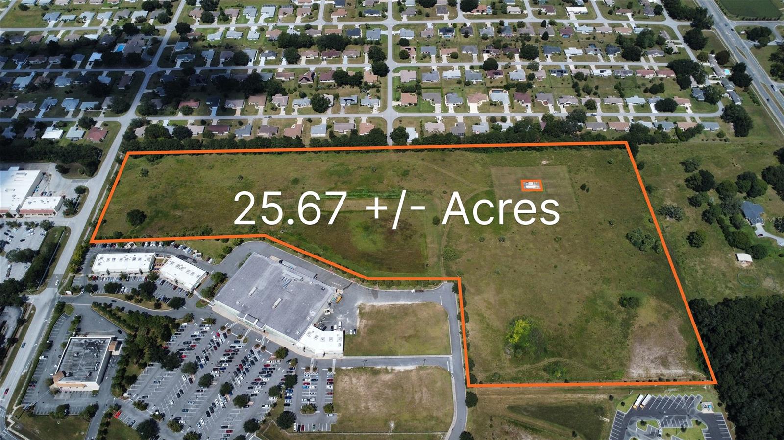 25+/- commercial acres next to Publix on Hwy 27 within the city of Ocala, FL, featuring water and sewer available to the property.  The property's future land use is Low Intensity, which provides zoning for a wide variety (B-2, B-4, M-1, PD) of different uses including retail, office, self storage, mini warehouses and other types of commercial business.  The current zoning is R-3, providing up to 18 residential units an acre for a total of 396 multifamily units. The estimated rezoning timeline is four months. This offering includes two parcels totaling 25.67 acres (22.03 and 3.64 acres).  The 3.64 acres provides drainage retention with shared capacity for the Publix and remaining 22.03 acres.  Major employers and retailers surround the property including: Chewy, FedEx, Amazon, AutoZone, UF Shand's Hospital, HCA Emergency Care, Publix, Starbucks, Chase Bank, Regions Bank, Walgreens, McDonalds, Gold's Gym and AutoZone.  I-75 is a three minute drive east and the billion-dollar World Equestrian Center is a 12 minute drive west.  The new Buc-ees and I-75 interchange will be a short 5 minute drive.  Marion County owns a .05+/- acre well, with a 100' circumference protection buffer located in the NE portion of the property.