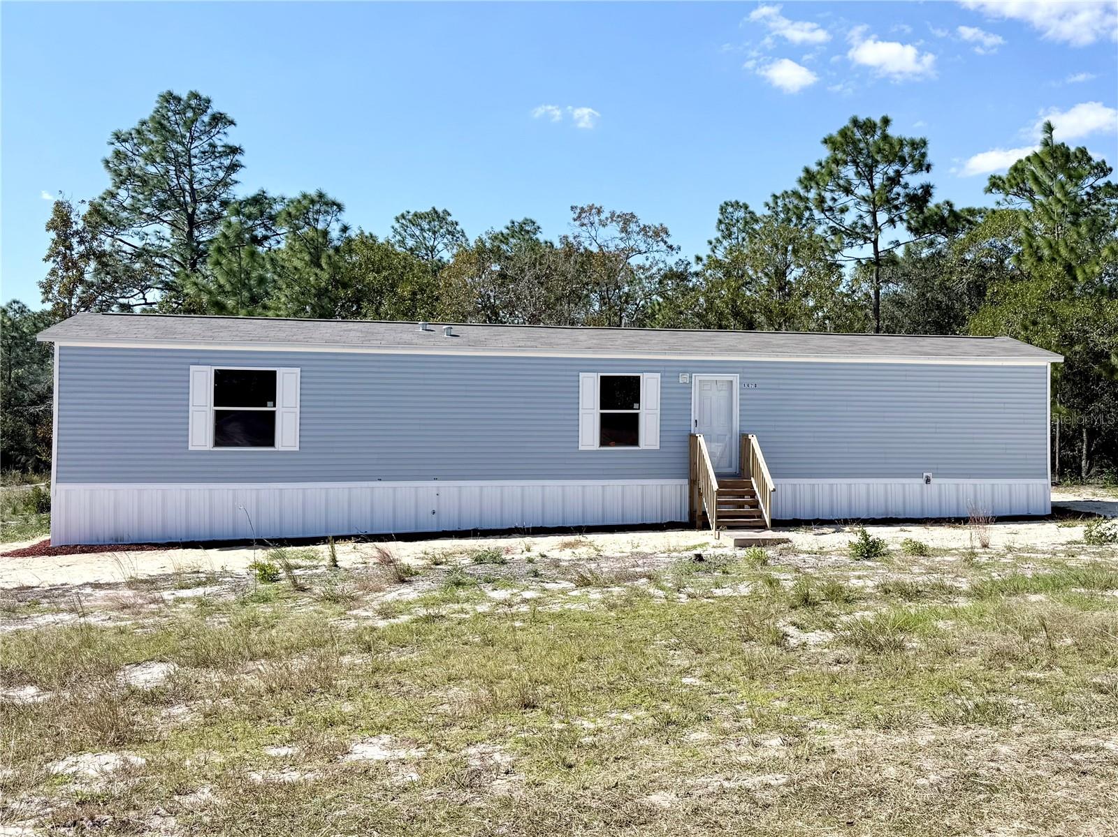 Virtually Staged. Move right into this BRAND NEW 3-bedroom/2-bathroom Champion manufactured home. New stainless steel appliances are included. Paved road access to a .25 acre corner lot. The property is eligible for many financing options with low and no down payment for qualified borrowers.