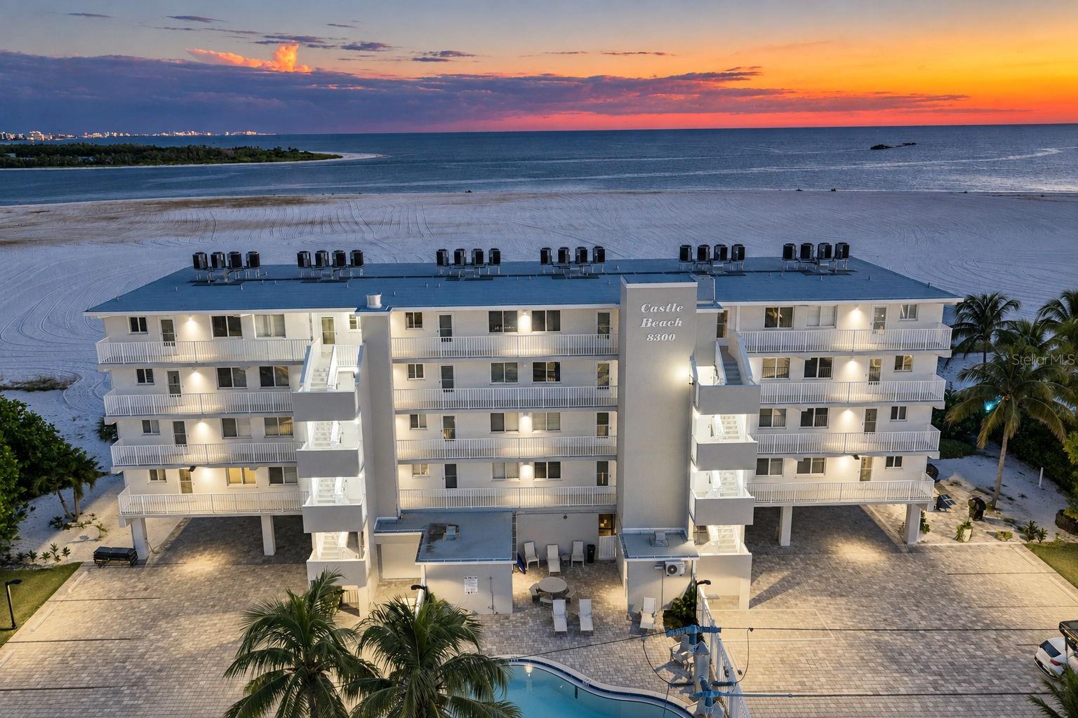 Beachfront living meets exceptional investment potential in this completely renovated, turnkey-furnished penthouse on Fort Myers Beach, where breathtaking Gulf views, sugar sands, and spectacular sunsets await. Situated on the fourth and highest floor, this 2-bedroom, 1.5-bath residence offers desirable southern exposure, abundant natural light, and sweeping views of the sparkling Gulf waters. Completely transformed from top to bottom in 2026 and offered with all brand-new, never-used furnishings, this coastal retreat delivers the appeal of an entirely new residence. Virtually every aspect has been replaced or updated, including new flooring, appliances, air conditioning, water heater, and much more. With one-week rentals permitted, this property presents exceptional income-producing potential, offering investors the opportunity to capitalize on Fort Myers Beach’s vacation rental market without the added expense of renovations or furnishings, while retaining the flexibility of personal beachfront enjoyment. The top-floor setting provides added privacy with no neighbors above, while a dedicated under-building parking space, HOA-provided flood insurance, and a pet-friendly policy for owners add convenience and value. Ideally located on the desirable south end of Fort Myers Beach, residents and guests enjoy convenient access to the revitalized Santini Marina Plaza, waterfront dining, shopping, and entertainment. Spend your days enjoying the sugar sands and turquoise Gulf waters before unwinding with unforgettable Southwest Florida sunsets. Whether you’re seeking a personal beachfront escape, full-time residence, or income-producing investment, this beautifully transformed condominium offers an exceptional combination of coastal luxury, rental flexibility, and an unbeatable Gulf-front location.