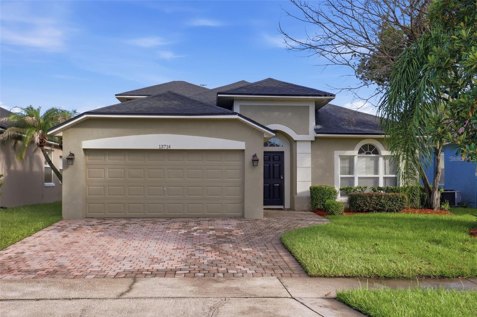 Are you ready to finally add the most important key to your keychain in 2026?  if you've been thinking about homeownership but are on the fence, this is your opportunity.  Seldom does a pool home in Hunters Creek become available at this price point, so why should someone else move in before the holidays and not you?  13714 Huntwick Drive is conveniently located right off Town Center Loop Blvd, providing you extraordinarily easy access to all that Hunters Creek has to offer, including Osprey & Eagle Park, pickleball, basketball & tennis courts, as well as baseball and softball fields.  Not to mention, it is only minutes from the 417, Florida Turnpike, a plethora of restaurants and shopping, only 15 minutes from hospitals, and 25 minutes to Disney World Parks & Resorts.  Once inside you can instantly appreciate the care and maintenance invested in this home, including the well-updated kitchen with stainless steel appliances, a timeless backsplash and espresso-colored cabinetry.  Directly in the middle of the home, acting as the nucleus where everyone gathers, this space was designed to keep the host fully engaged with the other guests and family.  Three generously sized bedrooms are on the first floor, each with ceiling fans and large walk in closets.  Your new primary bedroom is also on the first floor, and has its own en-suite bathroom, offering granite counters with dual sinks, a walk-in shower and a separate soaking bathtub.  The 5th bedroom upstairs can also serve as a home office, homeschooling space, or even a workout room.  If you like to entertain, and want to take advantage of the great weather Orlando offers, your new pool & spa will set the backdrop for those memories. With no immediate rear neighbors, imagine spending hours by this pool, enjoying year-round holidays with friends and family, and cooking out while you splash around in your own private pool.  >ZERO CARPET IN THE ENTIRE HOME | 2018 ROOF | NO REAR NEIGHBORS | LOW HOA | WALK TO HUNTERS CREEK MIDDLE SCHOOL | WALKING DISTANCE TO PUBLIX, RESTAURANTS & CAFES | PURCHASE BY THE END OF 2026 TO CLAIM HOMESTEAD IN 2027!<  Don't you deserve to finally be a homeowner?