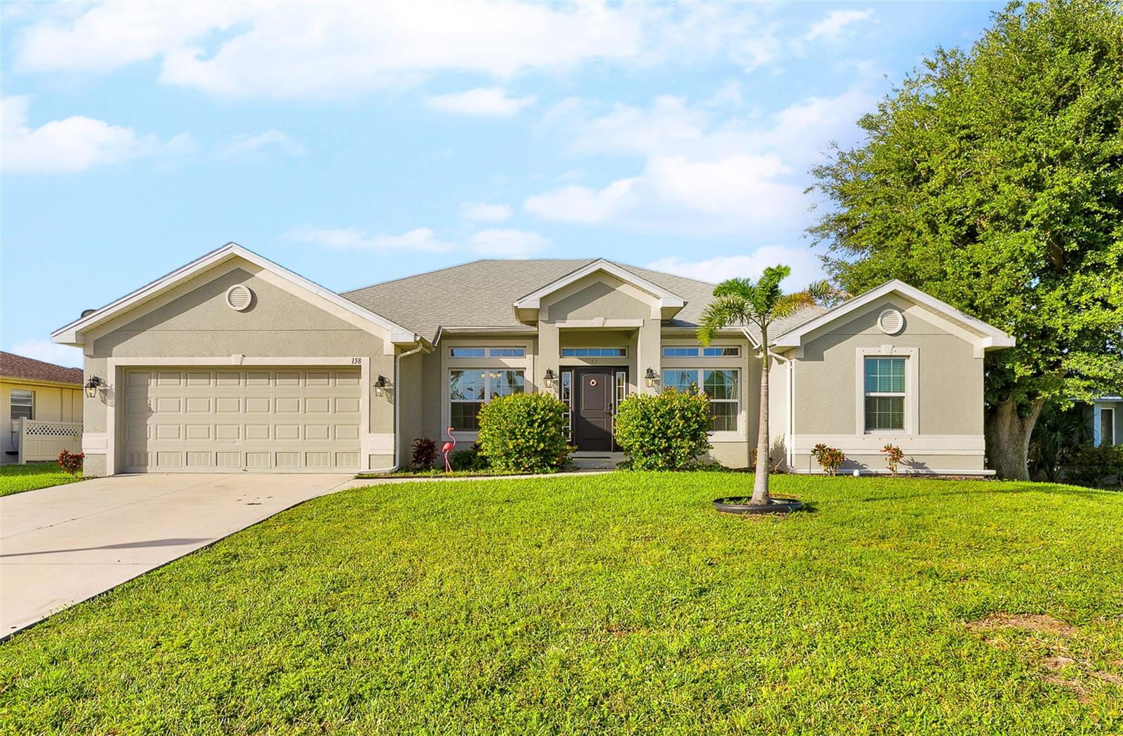 This 2018 built 4 bed 2 bath home with a heated pool is amazing. on the water canal. It  boasts over 2100 sq ft of living space under air. With easy access to golf courses and waterways.
