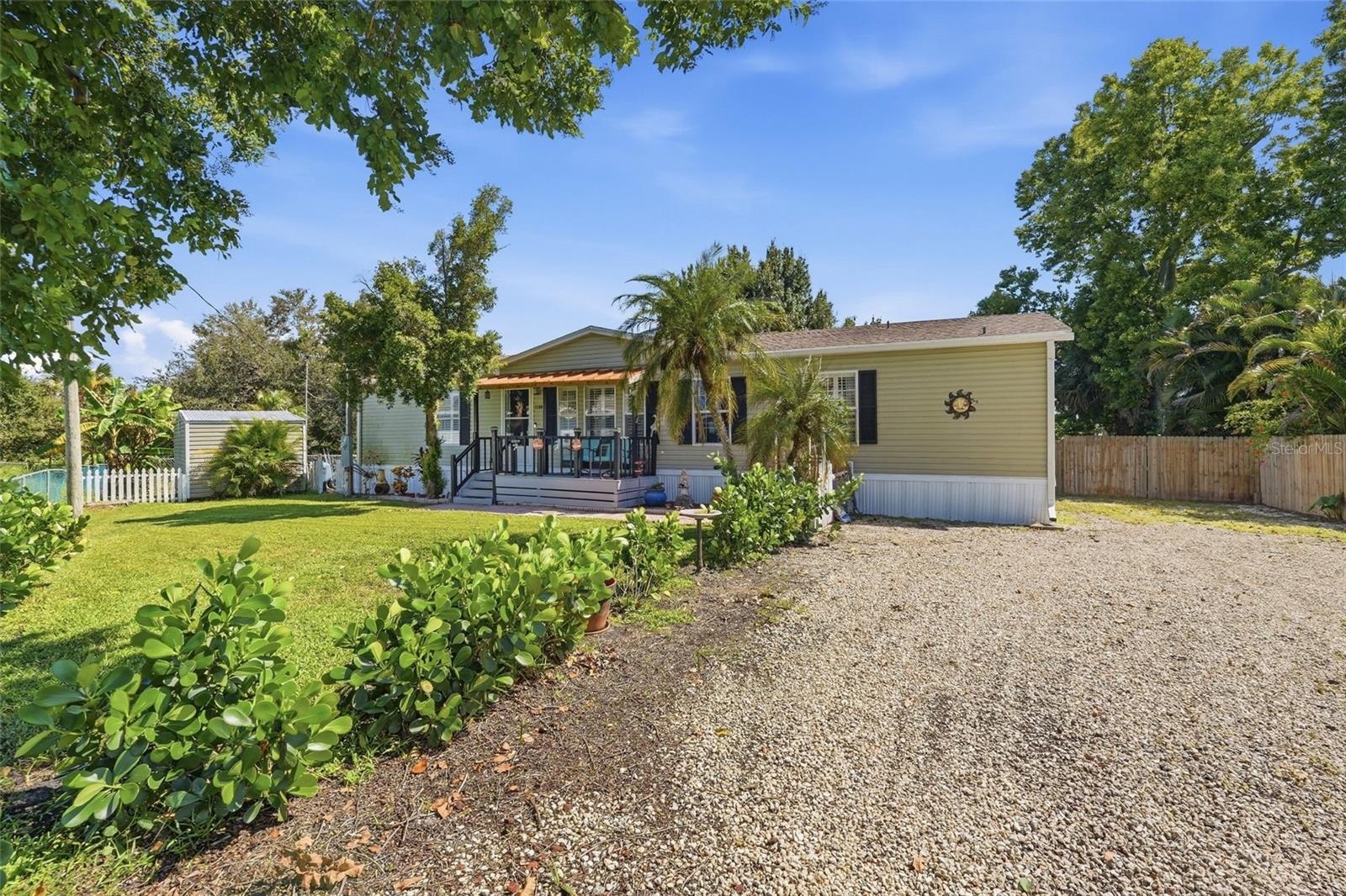 If you’ve been waiting for a home that gives you more space, more updates, and more freedom without the “more” price tag… this is it. This 3-bedroom, 2-bath home offers 1,860 square feet of living space with an open, comfortable layout that actually gives you room to LIVE. The large kitchen flows right into the dining and living areas, making this home perfect for everything from quiet weeknight dinners to a house full of people on the weekends. With multiple living spaces, there is plenty of room to spread out, entertain, work from home, or finally have that extra space you’ve been looking for. The sellers have poured a ton of love into this property, with improvements since 2020 including a new roof, air conditioner, flooring, water heater, well equipment and water softener, updated kitchen and bathroom faucets, new stove, light fixtures, fresh paint throughout most of the home, underlayment and insulation, skirting, and more. Outside, they kept going with a newer front porch, screened back porch, fencing, front gutters, and plantation shutters. There is even a real fireplace inside, giving the home a little extra personality you don’t find every day. And the outdoor space? This is where Florida starts showing off. Sip your morning coffee on the front porch, spend your evenings on the screened back porch, enjoy the fenced yard beneath mature shade trees, or take advantage of the property’s freshwater canal access. The quarter-acre lot gives you breathing room without giving you an entire weekend of yard work, and the gravel drive offers plenty of parking. With no HOA, plus well and septic, this property checks a whole lot of boxes at a price point that is getting harder to find.