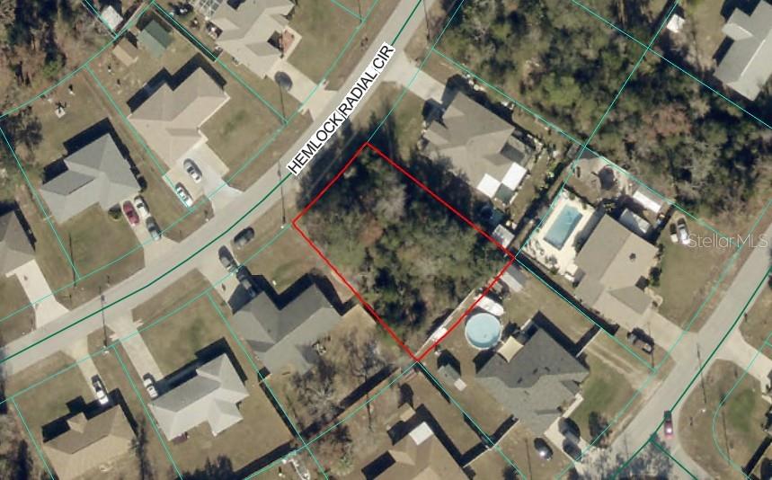 Build your dream home here or hold and invest. This .26 acre treed lot on Hemlock Radial Circle in the northern part of Silver Springs Shores between SE 64th Ave Rd and Pine Rd is zoned for single family site-built homes, no mobiles. Lots of new construction all around it. Flood zone X, Not in a County Prone Flood area either. No HOA and near shopping, restaurants, and schools. Do not miss this opportunity. Take a look and drive by