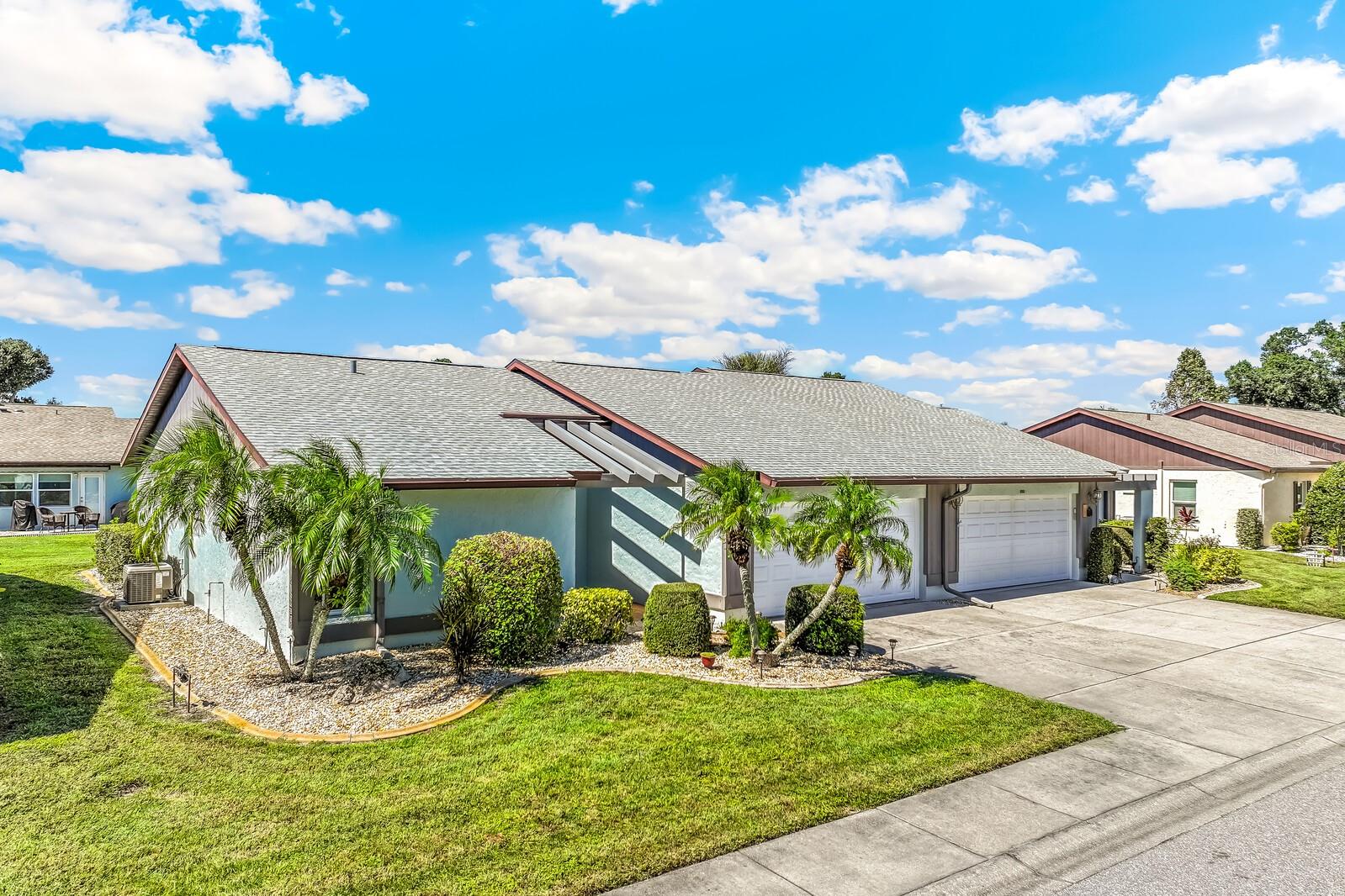 Welcome to a home where you will enjoy comfortable Southwest Florida living in this inviting 55+ community. Your new home features cathedral ceilings that create an open, airy atmosphere and ceramic tile flooring throughout for easy maintenance. The main bedroom offers a walk-in closet, while built-in cabinetry off the dining room and in the main living area provides convenient storage and added character. The large open kitchen includes a breakfast nook to enjoy your morning coffee or less formal meals, a closet pantry and plenty of cabinet space. Off of the kitchen is the attached 2 car garage and on the other side, a pass-through window to a roomy sitting area. A rare coat closet near the entry adds a practical touch, and the back patio features a retractable awning, creating a wonderful space to relax outdoors in the shade. Recent mechanical improvements include a new hot water heater installed April 2026 and a new HVAC installed June 2022.

Delight in a variety of community amenities, including a swimming pool, tennis courts, shuffleboard, and a clubhouse available for scheduling private events and gatherings. Lawn and exterior maintenance are included, offering added convenience and more time to enjoy the Florida lifestyle.

Conveniently located just a short drive from historic Dearborn Street, you'll find a charming selection of local shops, restaurants, and dining options. The beautiful Gulf Coast beaches are also nearby, making it easy to enjoy sunny days by the water. Whether you're looking for a full-time residence, a seasonal getaway, or a low-maintenance lifestyle, this home offers comfort, convenience, and community amenities in a desirable Englewood location!