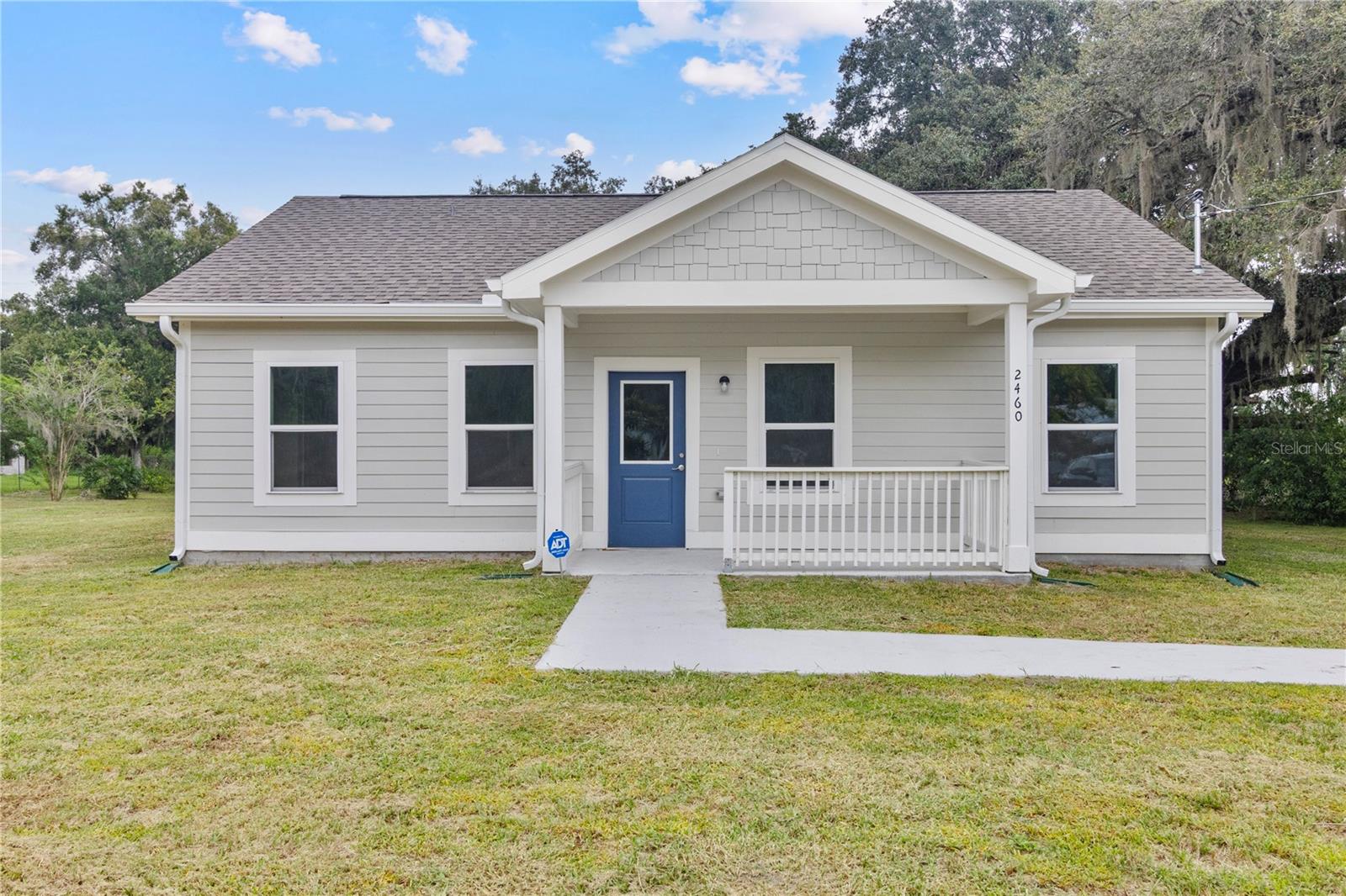 Welcome to your BRAND-NEW COUNTRY OASIS! Situated on 1.25 beautiful acres, this 2-bedroom, 2-bath home offers the space, privacy, and peaceful setting you’ve been looking for while still being conveniently close to everyday amenities. Mature trees are scattered throughout the property, creating a picturesque country atmosphere and plenty of shade.

Step inside to an inviting open floor plan featuring vaulted ceilings, luxury vinyl plank flooring, a spacious kitchen and living area, and a beautiful walk-in shower. Outside, the huge yard provides endless possibilities with plenty of room for entertaining, gardening, outdoor activities, pets, and all your recreational toys.

A detached pole barn with electric adds even more value and versatility—perfect for equipment, storage, a workshop, or your weekend projects. Additional features include gutters and plenty of usable outdoor space. Enjoy peaceful country living without giving up the convenience of being close to shopping, dining, schools, and more. Come experience everything this beautiful 1.25-acre property has to see!