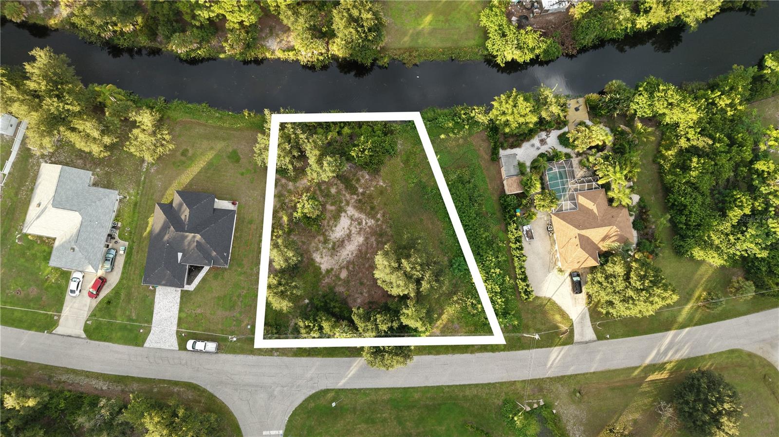 Prime residential 0.33 acre lot opportunity in Englewood, Charlotte County, located at 7064 Rosemont Dr (PID: 412011202009). 

Situated in a desirable residential area, this property offers convenient access to Winn-Dixie supermarket (approximately 0.59 miles), Vineland Elementary School (1.06 miles), LA Ainger Middle School (1.18 miles), and Ann and Chuck Dever Regional Park (2.47 miles). The lot is located in Flood Zone X, a low-risk area outside the 100-year and 500-year floodplains, with no wetlands close by, allowing for full lot utilization without environmental buffers or mitigation requirements. 

Buyer should verify all zoning, setbacks, utility availability, and development requirements with the Charlotte County Planning Department. The property is available for a self-guided tour. Subleasing is not permitted. This lot is not available for rent or lease.