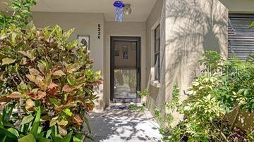 LAKEFRONT LIVING AT AN EXCEPTIONAL VALUE IN SOUTH SARASOTA! Enjoy sparkling lake views right from your own backyard! Welcome to sought-after Lake Arrowhead, a hidden gem in South Sarasota offering affordable Florida living surrounded by lush tropical landscaping, 
picturesque lakes, and an inviting community atmosphere. PRICED TO SELL and ready for you to enjoy! This desirable GROUND-FLOOR RESIDENCE offers easy accessibility, a covered entryway, a comfortable floor plan, and a private screened patio overlooking the serene lake and beautifully maintained grounds. Imagine relaxing with your morning coffee or unwinding in the evening while enjoying peaceful water views and watching the abundant wildlife throughout the day! The kitchen offers appliances that have been updated within approximately the last 2-5 years, and you'll enjoy the convenient breakfast bar. The primary bathroom features a newer vanity and updated flooring. Both bedrooms have walk-in-closets. A DEDICATED ONE-CAR CARPORT WITH STORAGE adds convenience and practicality. Enjoy the benefits of LOW-MAINTENANCE LIVING, with HOA fees that include cable, pest control, exterior maintenance, and lawn care. At this attractive price, this condominium offers an affordable alternative to many single-family homes without sacrificing the Florida lifestyle! Lake Arrowhead is an intimate community of just 64 condominiums, known for its beautiful landscaping, scenic lakes, and friendly neighbors. The charming Key West-style clubhouse is just steps away, offering a spacious gathering room, kitchen, and library. Residents can also enjoy the HEATED COMMUNITY POOL and nearby fishing pier. On-site management adds another level of convenience. Nature lovers will appreciate the community's proximity to the 72-acre Red Bug Slough Preserve, a pet-friendly outdoor destination featuring miles of walking trails, picnic shelters, a playground, and a fishing dock. What a wonderful place to enjoy the outdoors! LOCATION, LOCATION, LOCATION! Conveniently situated near world-renowned Siesta Key beaches, the Legacy Trail, Costco, Publix, several fitness centers, excellent dining, shopping, the Gulf Gate Library, and area A+ schools. The University Town Center Mall and vibrant downtown Sarasota are approximately 20 minutes away, offering cultural attractions, opera, theaters, fine dining, boutique shopping, Selby Gardens, and so much more! Whether you're searching for a full-time residence or a seasonal Florida retreat, this lovely lakefront condominium offers an exceptional opportunity to enjoy comfort, convenience, natural beauty, and an affordable lifestyle. Make this South Sarasota treasure yours and start enjoying the peaceful lakefront lifestyle you've been dreaming of. You'll love this quiet community of great neighbors and the proximity to everything is wonderful.