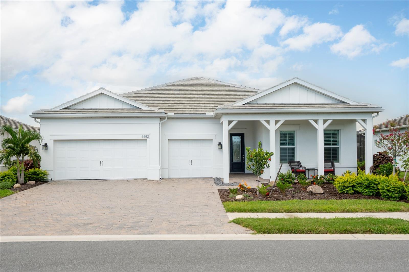 Welcome to Beachwalk by Manasota Key! This stunning 2024 DiVosta Renown POOL home features 3 bedrooms, 3.5 baths, and 2,797 sq ft of refined coastal living. All bedrooms offer private ensuite bathrooms. Enjoy a chef-inspired built-in kitchen with Calacatta Gold quartz, white cabinetry, and premium appliances, open to the gathering room with tray ceiling and impact zero-corner sliding glass doors that seamlessly connect to the covered lanai. Owner’s suite includes a spa-like walk-in shower with floor-to-ceiling tile and heavy glass enclosure. Additional highlights include an enclosed flex room, upgraded laundry with utility sink, 3-car garage with epoxy floor and hanging storage shelves, whole-house impact glass, plantation shutters, two remote-controlled wide shades, hurricane screens, whole-house generator, and a saltwater pool overlooking the pond. Resort-style community amenities, no CDD, and just minutes to Manasota Key beaches.