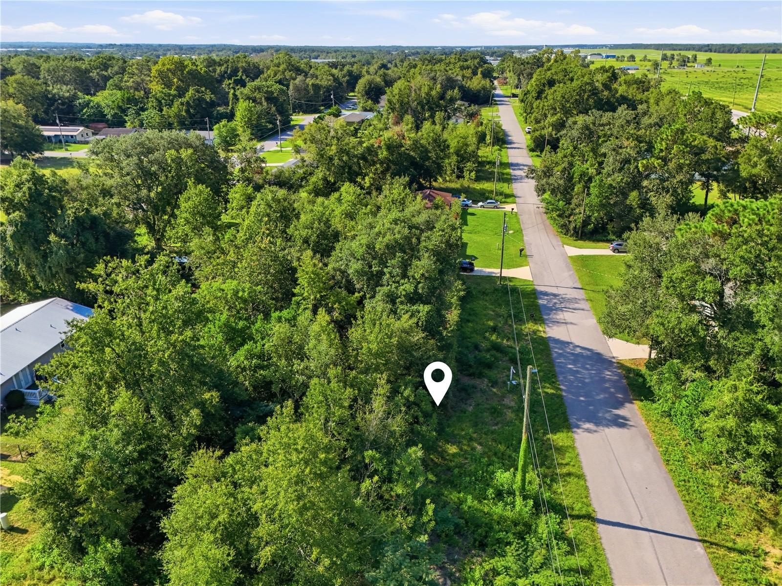 Own your parking. No HOA. No monthly fees. No landlord. Two deeded lots — Lots 85 & 86 in Ocala Ridge — sold together as one combined 0.11-acre parcel (50'x100') with 50 feet of paved road frontage on NW 59th Ct, Ocala FL 34482. One entry price. Two legal parcels. Put this land to work immediately: ? RV parking or boat storage — full-size, zero restrictions ? Work truck, trailer, or fleet vehicle parking ? Tool shed, workshop, or lockable storage structure ? Extra vehicle overflow or yard buffer for neighboring property owners ? Buy-and-hold land investment in a fast-growing NW Ocala corridor No HOA — park what you want, when you want. Located in an established neighborhood on a paved road, minutes from the World Equestrian Center, I-75, and Hwy 326. Surrounded by steady new construction activity throughout Marion County. Annual taxes are minimal. If you're currently paying monthly storage fees, this lot pays for itself in under 18 months — and appreciates while you use it. Buyer to verify intended land uses, utility availability, setback requirements, and applicable regulations with Marion County zoning prior to contract. Sold as-is. Parcel ID: 2304-017-085 / 086.