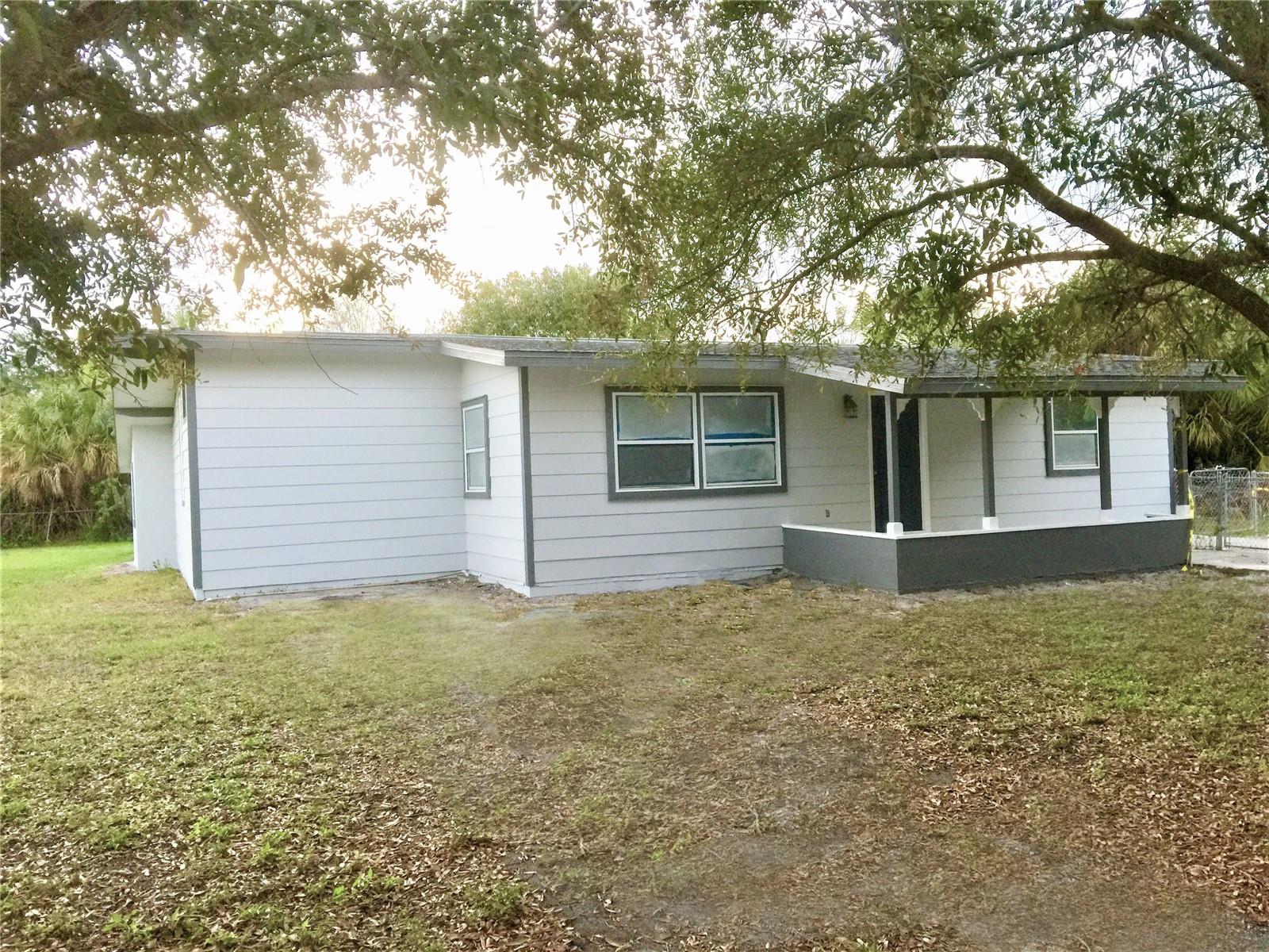 This beautifully refreshed 4-bedroom, 2-bathroom home in Punta Gorda offers the perfect combination of modern finishes, comfortable living, and Florida charm. Step inside and you'll immediately appreciate the updated wood-look tile plank flooring that flows throughout, creating a stylish, cohesive look that's both attractive and easy to maintain. The updated kitchen features granite countertops, refreshed cabinetry, and a welcoming space for preparing meals and gathering with family and friends. Both bathrooms have been tastefully updated, adding to the home's move-in-ready appeal. With four generously sized bedrooms, there's plenty of flexibility for a growing household, visiting guests, a home office, or whatever suits your lifestyle. Outside, the approximately 0.22-acre lot provides room for backyard barbecues, gardening, pets, or simply relaxing in the Florida sunshine. And the location makes it even better! Just minutes from historic downtown Punta Gorda, you'll enjoy waterfront dining, boutique shopping, Harborwalk along Charlotte Harbor, and easy access to boating, fishing, golf, and Gulf Coast beaches. Convenient access to major roadways and Punta Gorda Airport makes getting around a breeze. Whether you're a first-time homebuyer looking for an updated home without the hassle of major renovations, a growing household needing extra space, or an investor seeking a property with broad rental appeal, this home checks all the boxes! Don't miss your opportunity to make it yours. Schedule your private showing today!