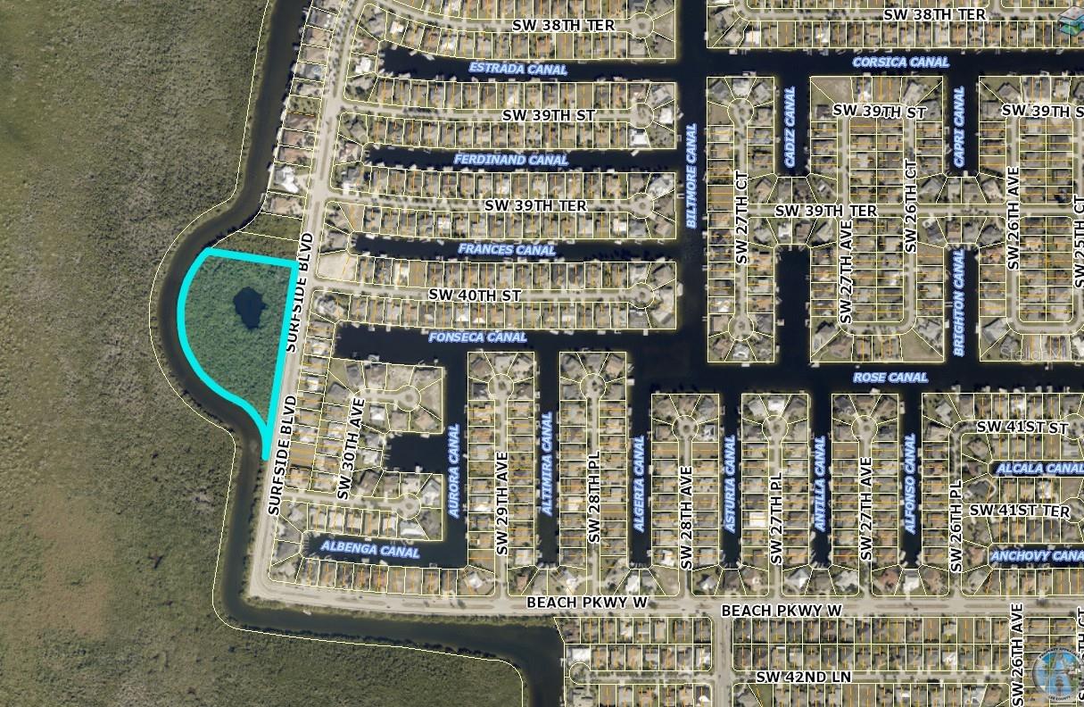 7 acres acres of undeveloped land with water frontage. Close to shops, marinas and restaurants.