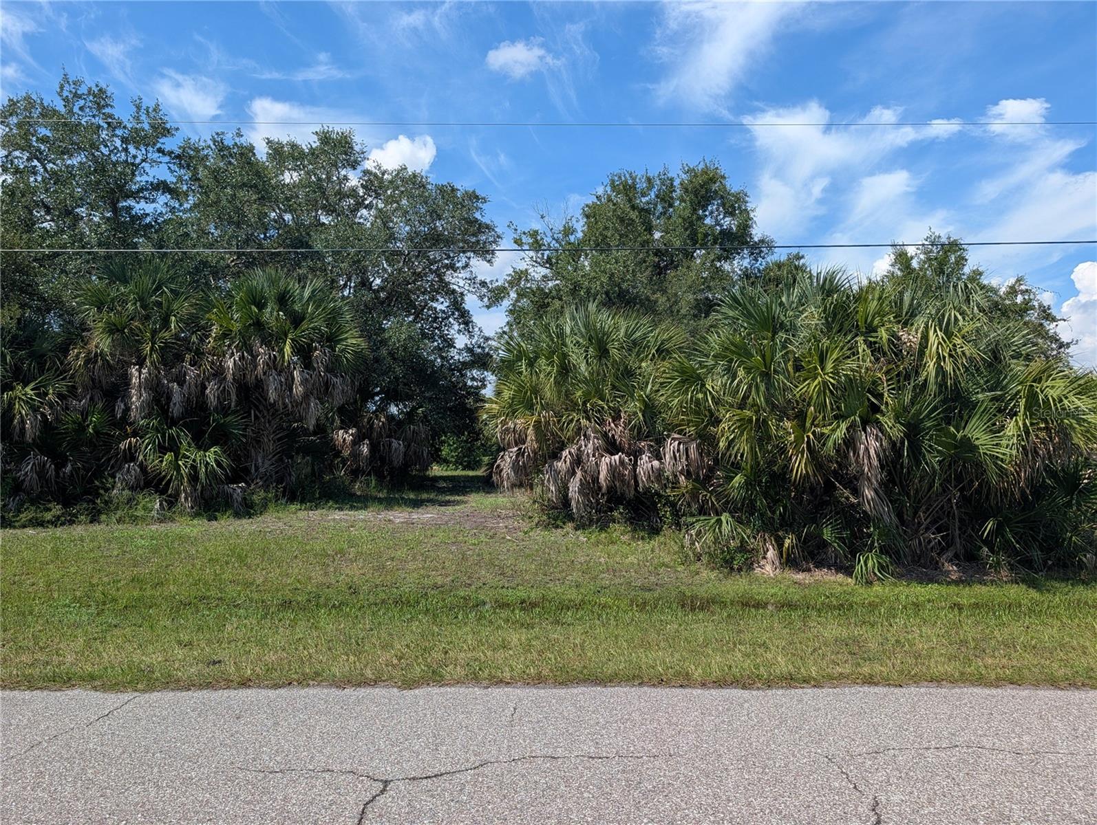 WATERFRONT LOT IN ROTONDA LAKES – BUY ONE OR BOTH! Build your dream home in the desirable Rotonda Lakes community, where peaceful waterfront living meets the Florida lifestyle! This beautiful waterfront lot offers a wonderful opportunity to create your own slice of paradise. Imagine enjoying your morning coffee overlooking the water, spending afternoons fishing from your backyard, or simply relaxing and taking in the tranquil views. With low HOA fees, Rotonda Lakes is a great place to call home! WANT MORE SPACE? THE ADJOINING WATERFRONT LOT IS ALSO AVAILABLE! Purchase both lots to create an oversized waterfront homesite with additional room for privacy, a spacious outdoor entertaining area, a pool, or the possibility of designing a home with extra garage space for your boat, RV, or recreational toys, subject to HOA guidelines and county building requirements. Conveniently located near beautiful Gulf beaches, golf courses, boating, fishing, shopping, restaurants, and everything Southwest Florida has to offer. Whether you're ready to build your dream home now or invest for the future, don't miss this opportunity to own a piece of waterfront paradise in Rotonda Lakes!